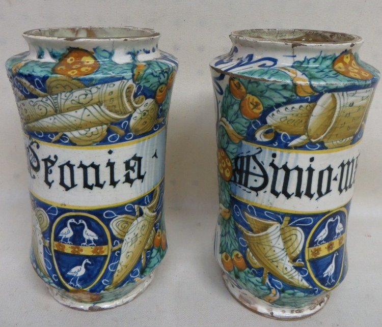 Two Italian apothecary jars dated 1580.: Two ancient Italian faience tin glazed apothecary jars - each hand painted - several minor chips to rim and base, several minor hairlines hardly noticeable. Date hand written in old script on back sid