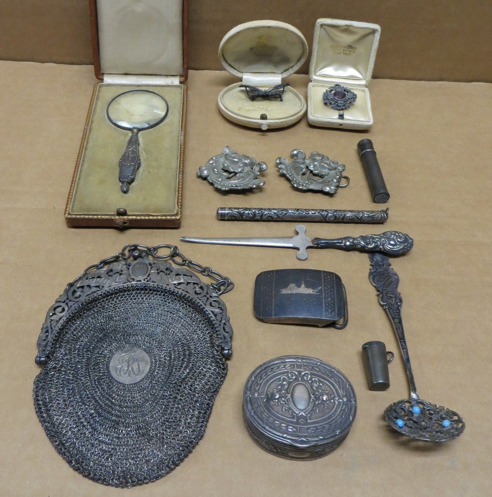 Collection of sterling ladies articles including S: Collection of sterling ladies articles including Sterling mesh purse dated 1901, pair of Chinese dragons buckles, 2 silver broaches one with amethyst stone signed Kohn, 4 silver desk articles, ornate 