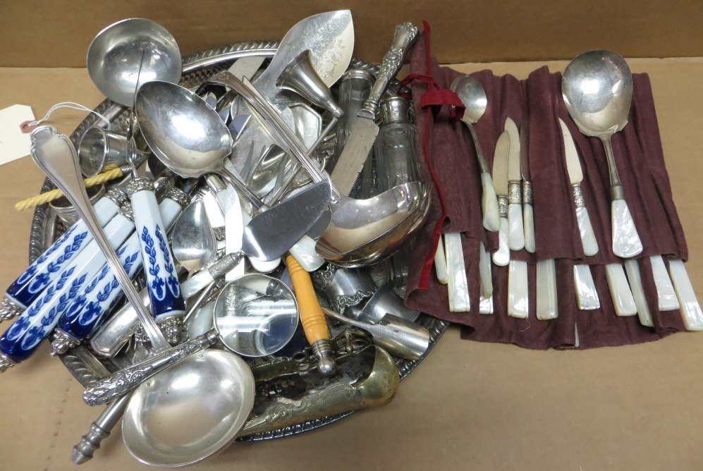 Large lot of mostly silver plate flatware and serv: Large lot of mostly silver plate flatware and serving pieces, some with mother of pearl handles. Provenance: From the estate of Elaine and Irving Sperber, Southbury Ct.