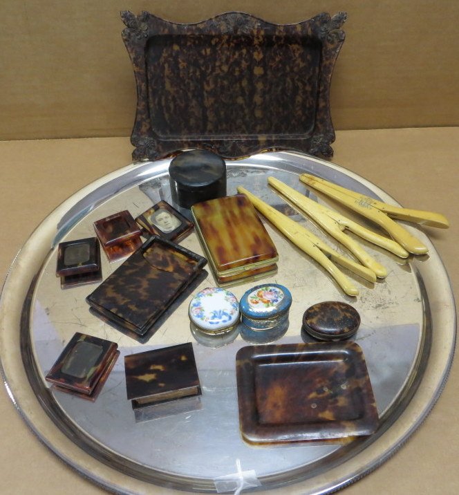 Collection of decorative articles.: Collection of decorative articles including faux (?) tortoise shell articles, 2 small patch boxes, 3 glove stretchers - early to mid-20th century. Provenance: From the estate of Elaine and Irving Sper
