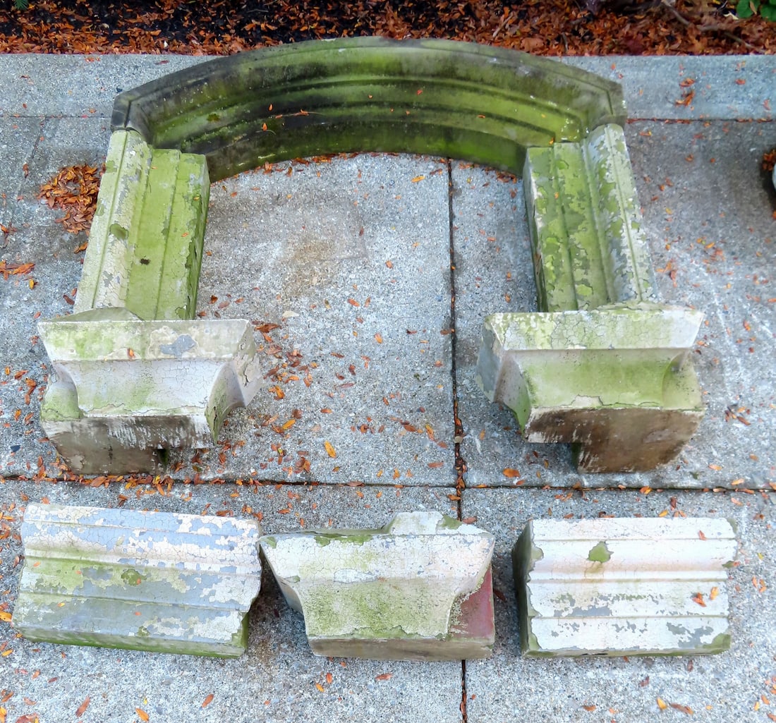 Grouping of carved stone building ornaments, likely parts to a window of a Federal period building,: Grouping of carved stone building ornaments, likely parts to a window of a Federal period building, including sill, arch and parts to side, circa 1850. The largest section, the arch, measures 52 1/4"W