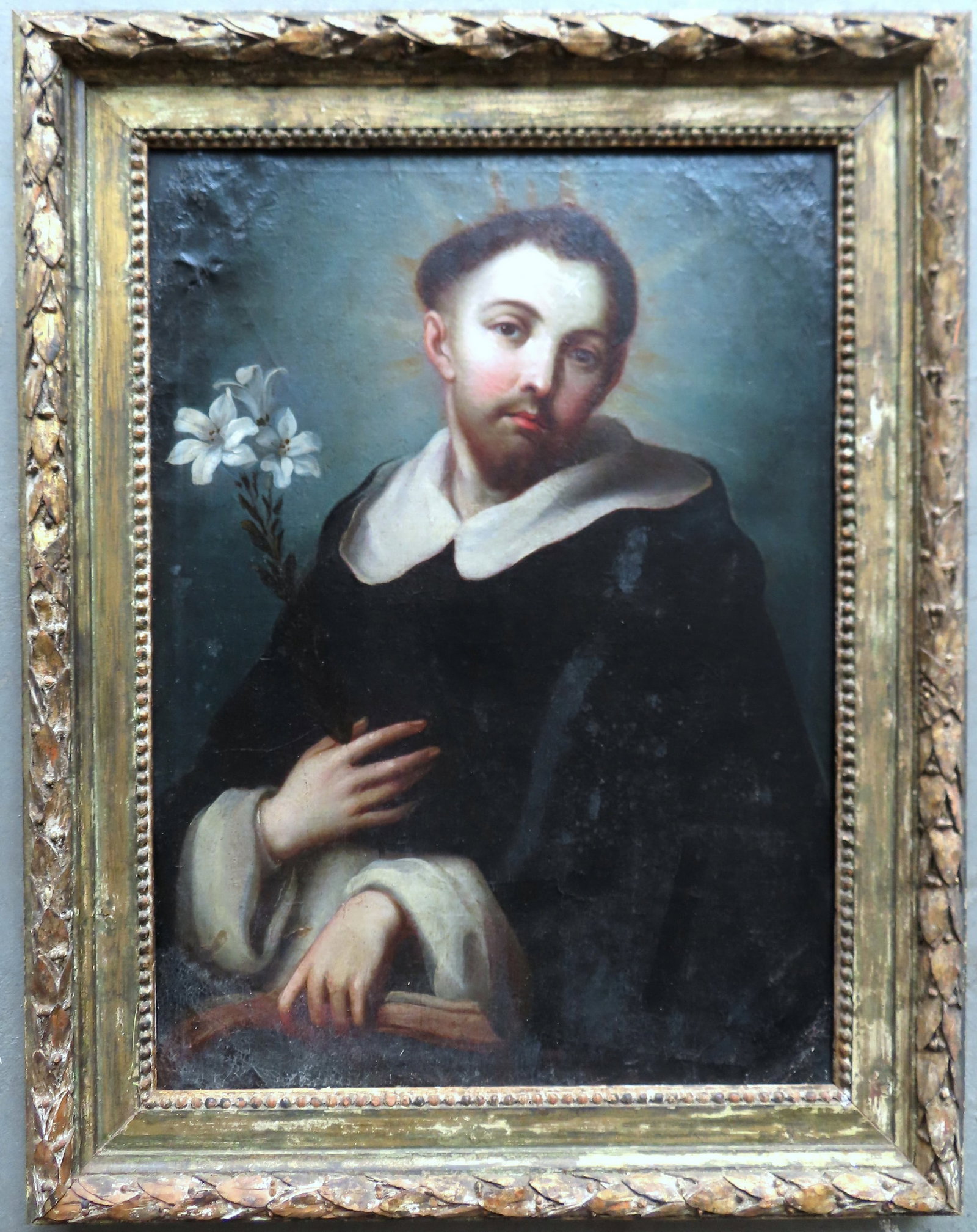O/C Large portrait of a saint, probably St. Dominic de Guzman, founder of the Dominican Order,: O/C Large portrait of a saint, probably St. Dominic de Guzman, founder of the Dominican Order, with star on forehead as this saint is often depicted - note the lilies in background, probably 17th cent