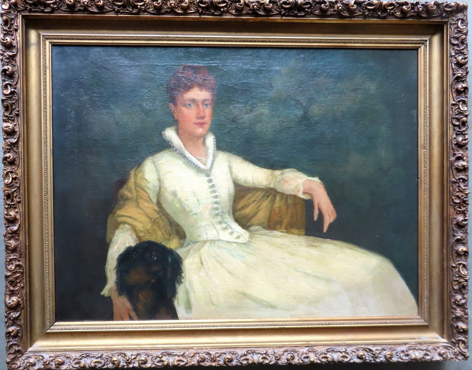Lawrence Carmichael Earle (1845 - 1921) was active/lived in Michigan, New York, New Jersey. O/C: Lawrence Carmichael Earle (1845 - 1921) was active/lived in Michigan, New York, New Jersey. O/C Portrait of reclining Edwardian lady with dog, signed L. C. Earle, late 19th century. With restoration i