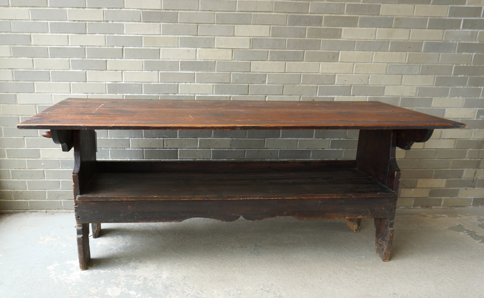 A large Hudson Valley hutch table, with shaped cutouts on sides and shaped front apron: A large Hudson Valley hutch table, with shaped cutouts on sides and shaped front apron, probably late 19th century in original finish. The top measures 72"L x 30 3/4"D x 29 3/4"H. Minor repairs, some 