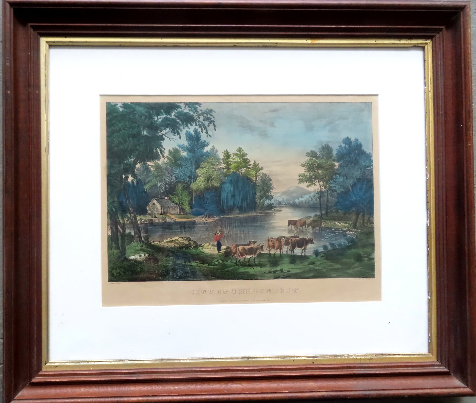 An original Currier & Ives, hand colored, titled "View On The Roundout", housed in a period black: An original Currier & Ives, hand colored, titled "View On The Roundout", housed in a period black walnut frame with newer matting. Sight size 16" x 11 7/8" and total frame size 22 3/8" x 26 1/4". Both