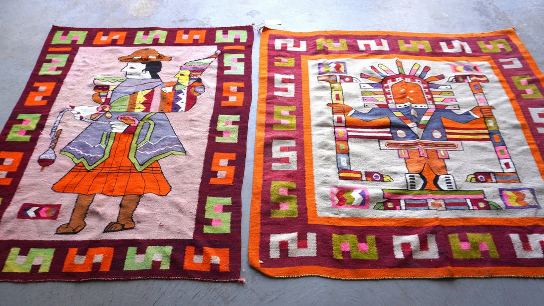Two hand woven rugs with large figure of native person in local dress, probably South American,: Two hand woven rugs with large figure of native person in local dress, probably South American, early to mid 20th century. The smaller rug with some pulls in threads, else good condition - the larger 