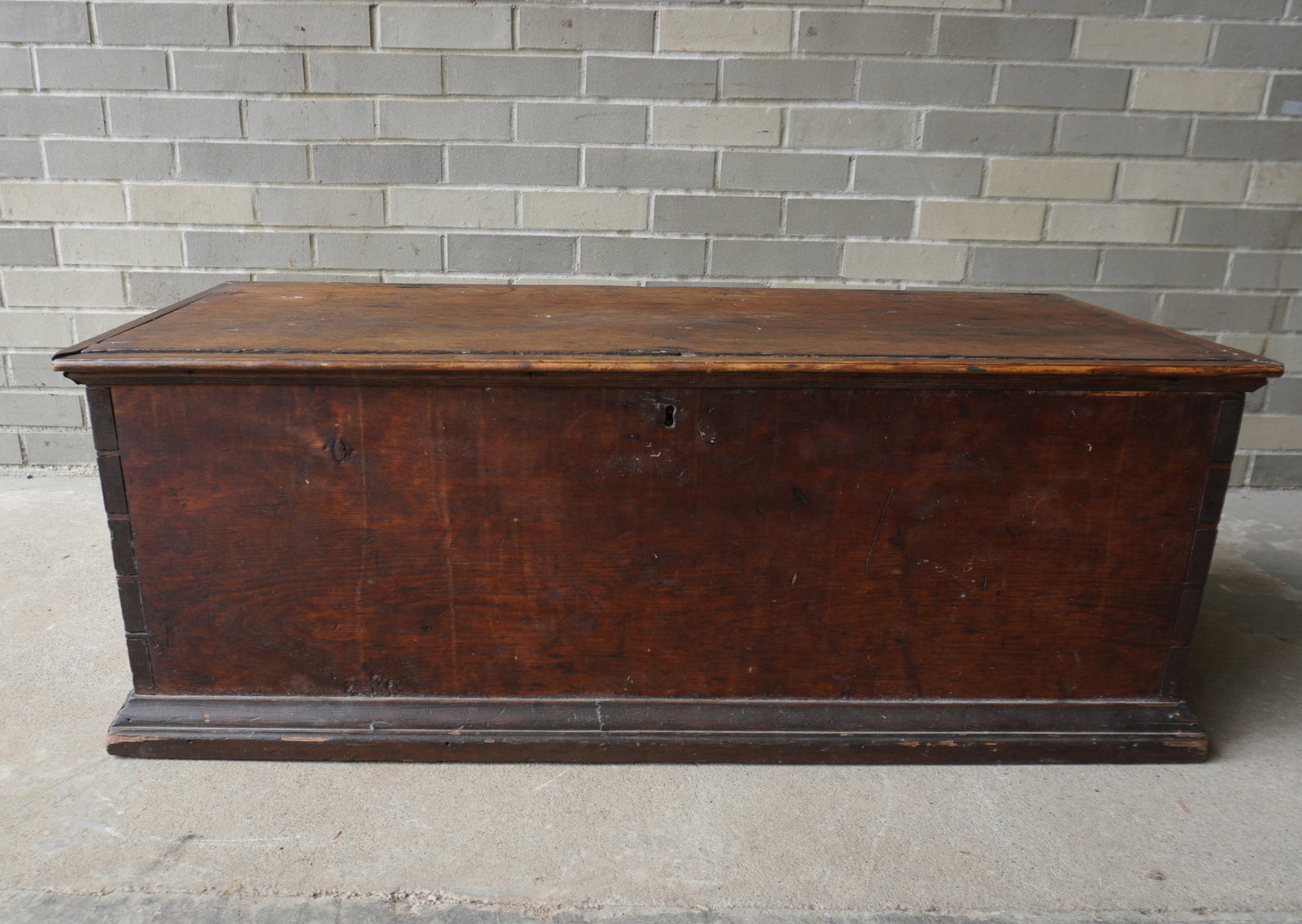Primitive pine blanket box with dovetailed construction, applied molded edge to lid and base,: Primitive pine blanket box with dovetailed construction, applied molded edge to lid and base, interior till, and rattail hinges, mid 19th century. Newer screws added to original hinges to hold them in