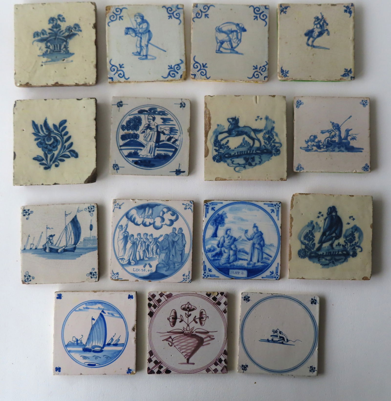 Grouping of 15 early hand painted Delft tiles, late 18th century. Including kids with toys, etc. The: Grouping of 15 early hand painted Delft tiles, late 18th century. Including kids with toys, etc. The largest 5 1/2" square. Most in good condition. Provenance: From a Rochester NY estate, name withhel