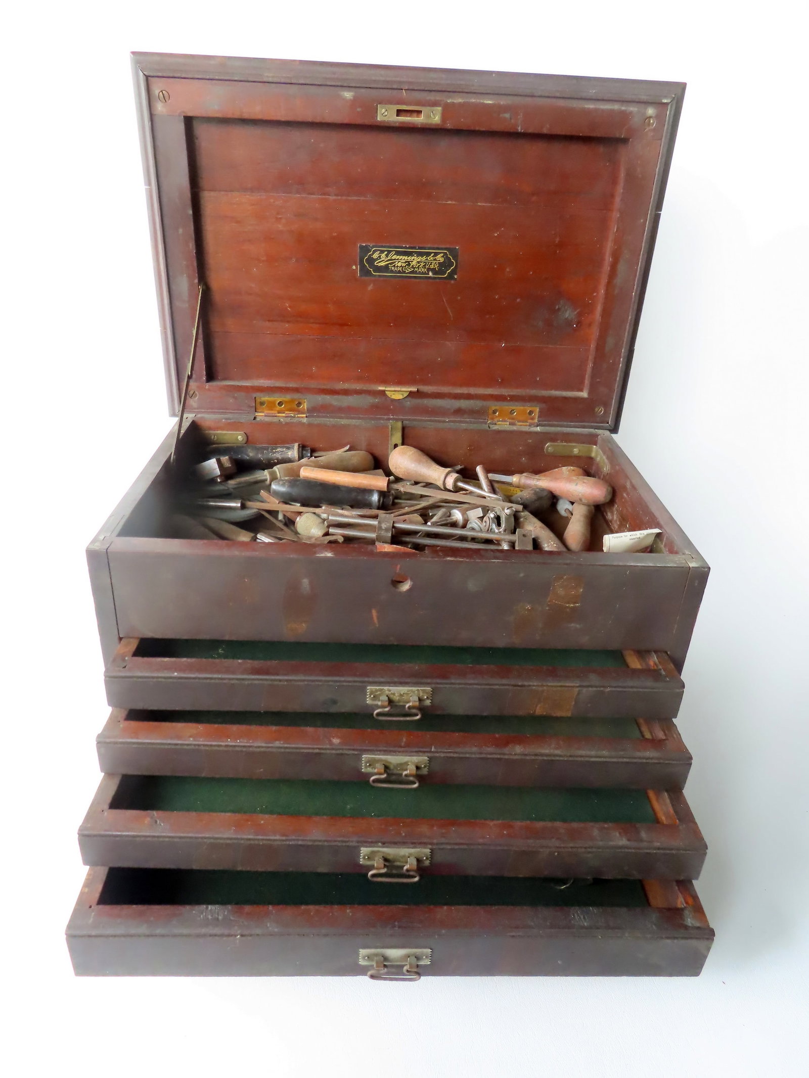 Machinist black walnut Victorian tool box having 4 drawers and lift top signed Jennings & Co. NY,: Machinist black walnut Victorian tool box having 4 drawers and lift top signed Jennings & Co. NY, late 19th century. Includes some tools (see photos). Missing lock, used but in good condition. Measure