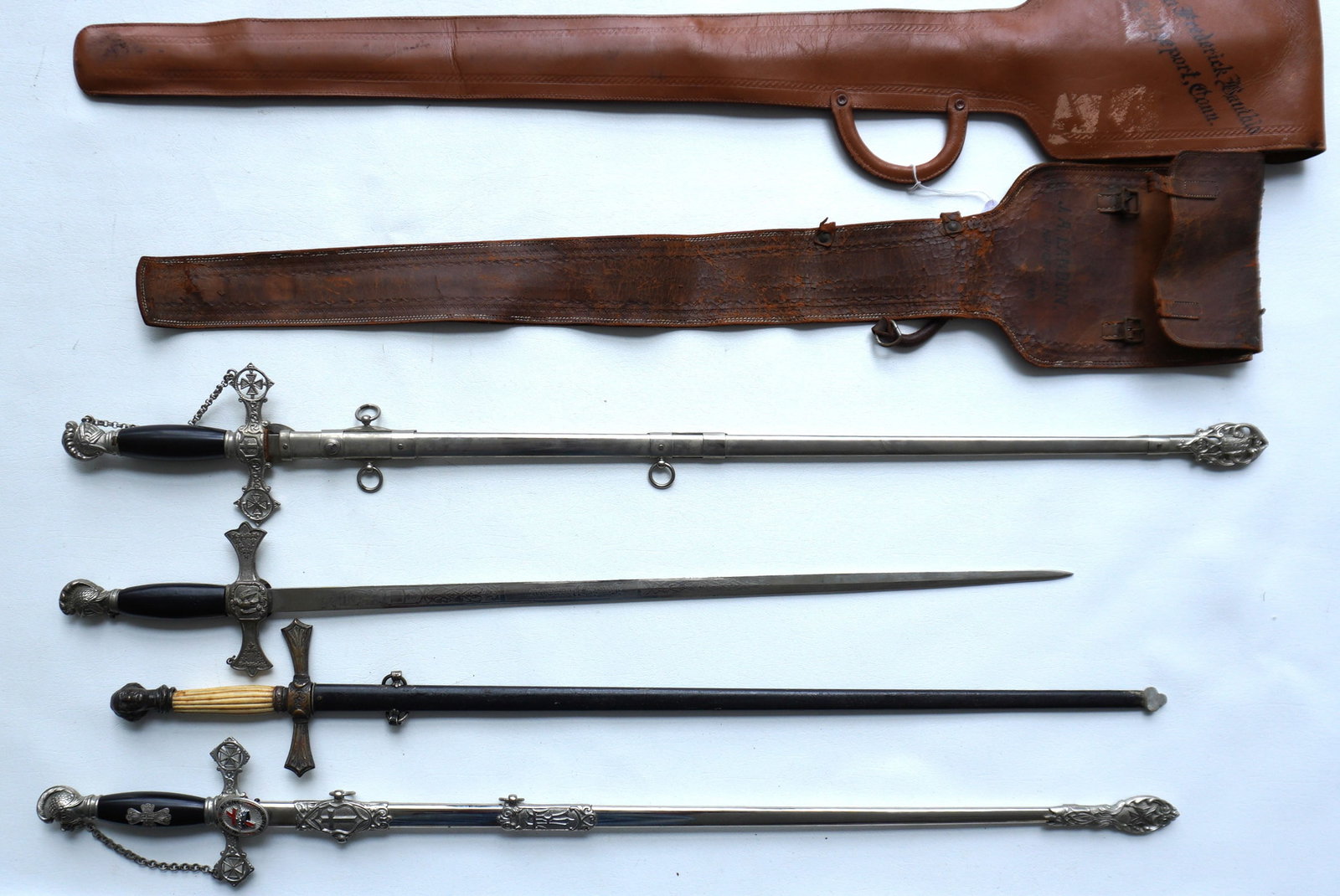 Grouping of 4 fraternal organization ceremonial swords, silver flask, etc., all belonging to the: Grouping of 4 fraternal organization ceremonial swords, silver flask, etc., all belonging to the same family. The swords include: Sword with engraved blade marked "John Frederick Banthin"- with scabba