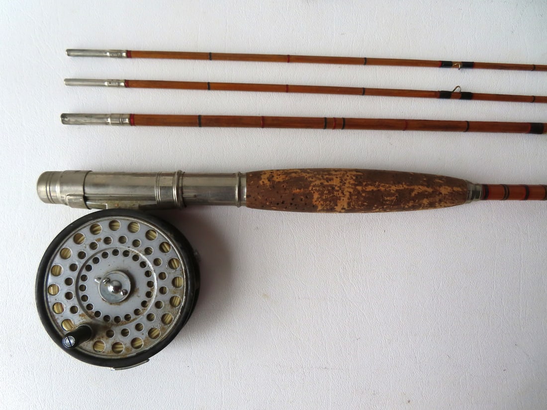 A vintage split bamboo fly rod, 3 section with extra tip and rod holder, signed "Abbey & Imbrie -: A vintage split bamboo fly rod, 3 section with extra tip and rod holder, signed "Abbey & Imbrie - Fishing Tackle That's Fit For Fishing". All 3 sections appear complete and are the same size - each ap