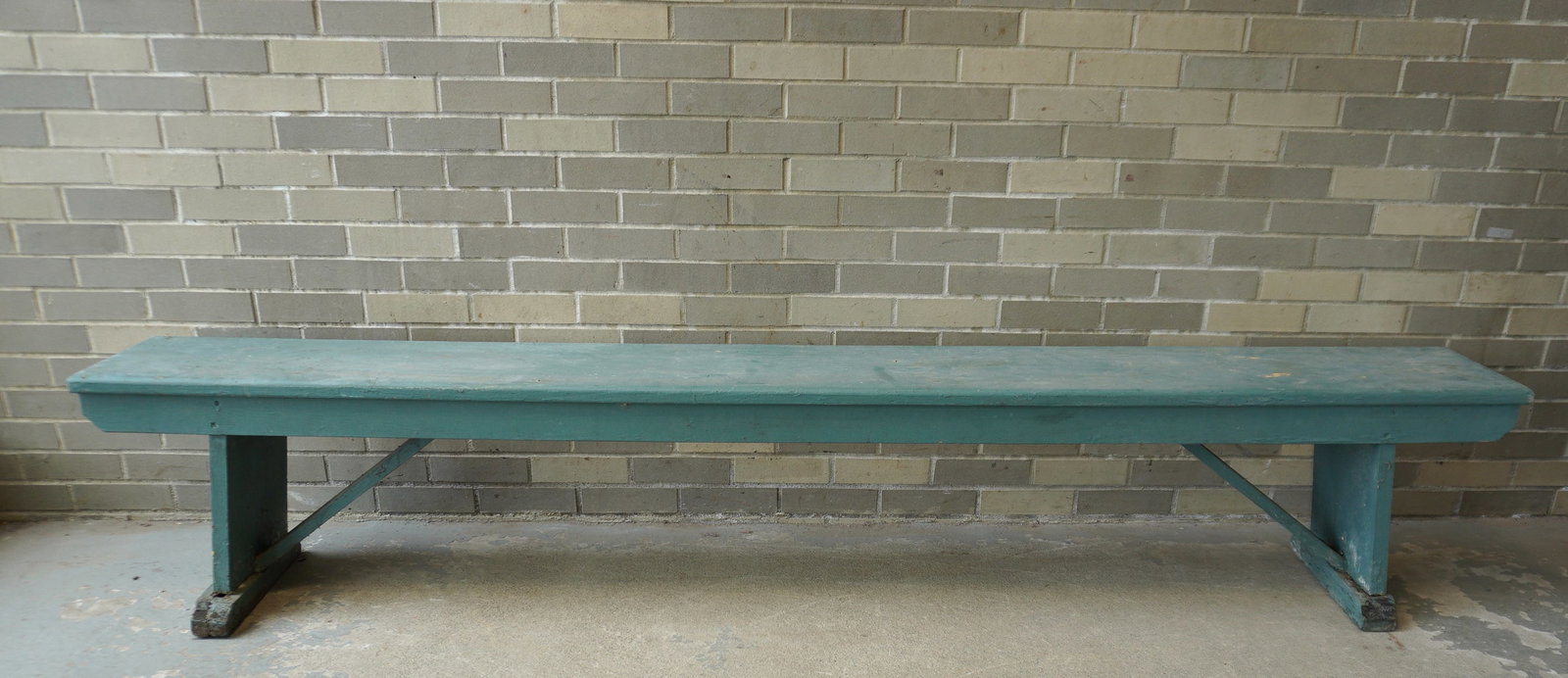 A long primitive bench with shoe feet. Layers of old paint, probably 20th century.: A long primitive bench with shoe feet. Layers of old paint, shoe feet with repairs mostly due to punky wood on bottom of feet (see photos), overall fair condition. Probably early to mid 20th century. 