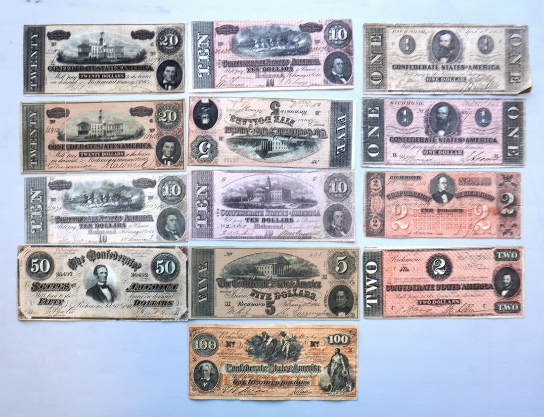 A grouping of 13 Confederate, Richmond Virginia, bank notes, most dated 1864, various denominations.: A grouping of 13 Confederate, Richmond Virginia, bank notes, most dated 1864, various denominations. Most in very good condition. PLEASE NOTE - A 5 and a 20 note are reproductions and marked "Reprinte