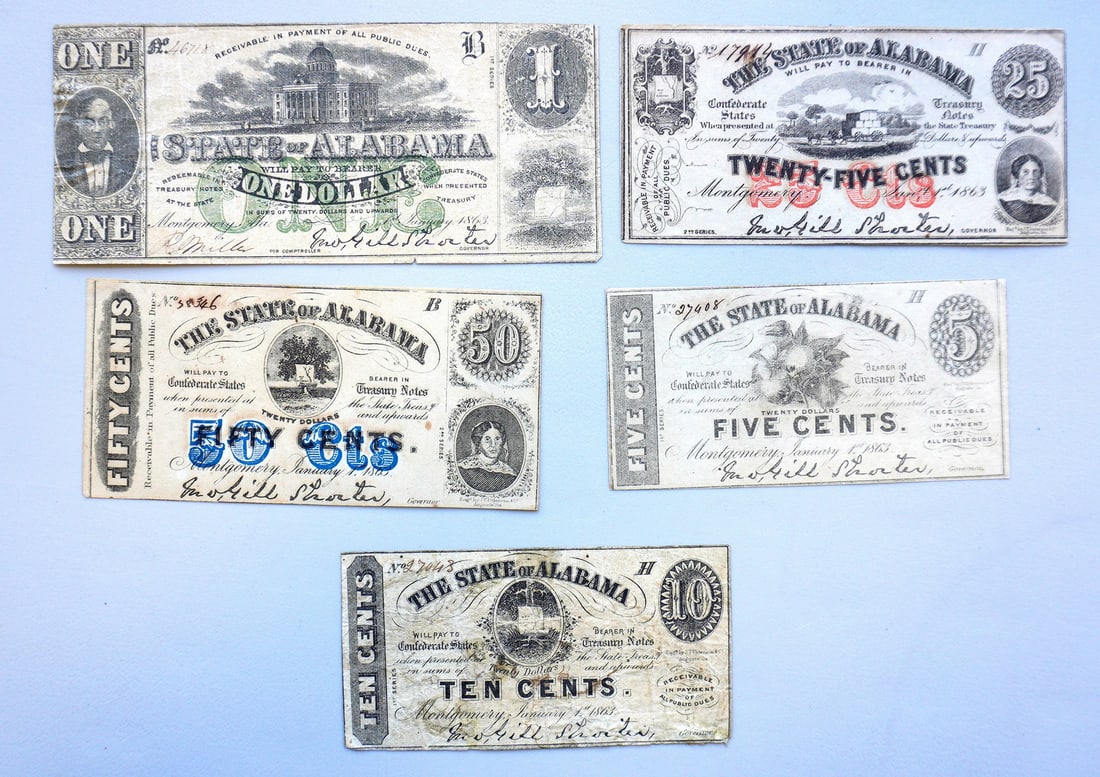 A grouping of 5 Confederate paper currency from State of Alabama including: 5 fractional notes and a: A grouping of 5 Confederate paper currency from State of Alabama including: 5 fractional notes and a dollar bill, all dated 1863. Most in very good condition.