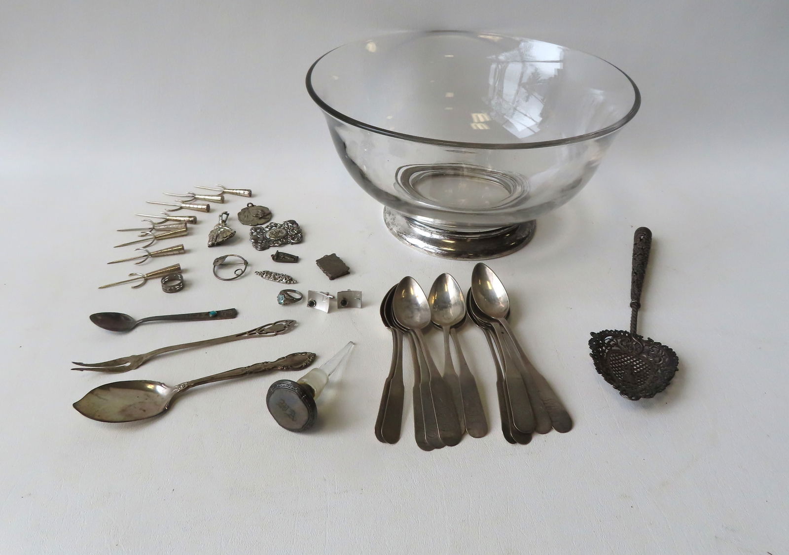 Grouping of silver objects including: 12 Fishkill NY matching coin silver teaspoons (slightly: Grouping of silver objects including: 12 Fishkill NY matching coin silver teaspoons (slightly different lengths) all by John Bedford, circa 1790 all with use wear to bowls else good condition; sterlin