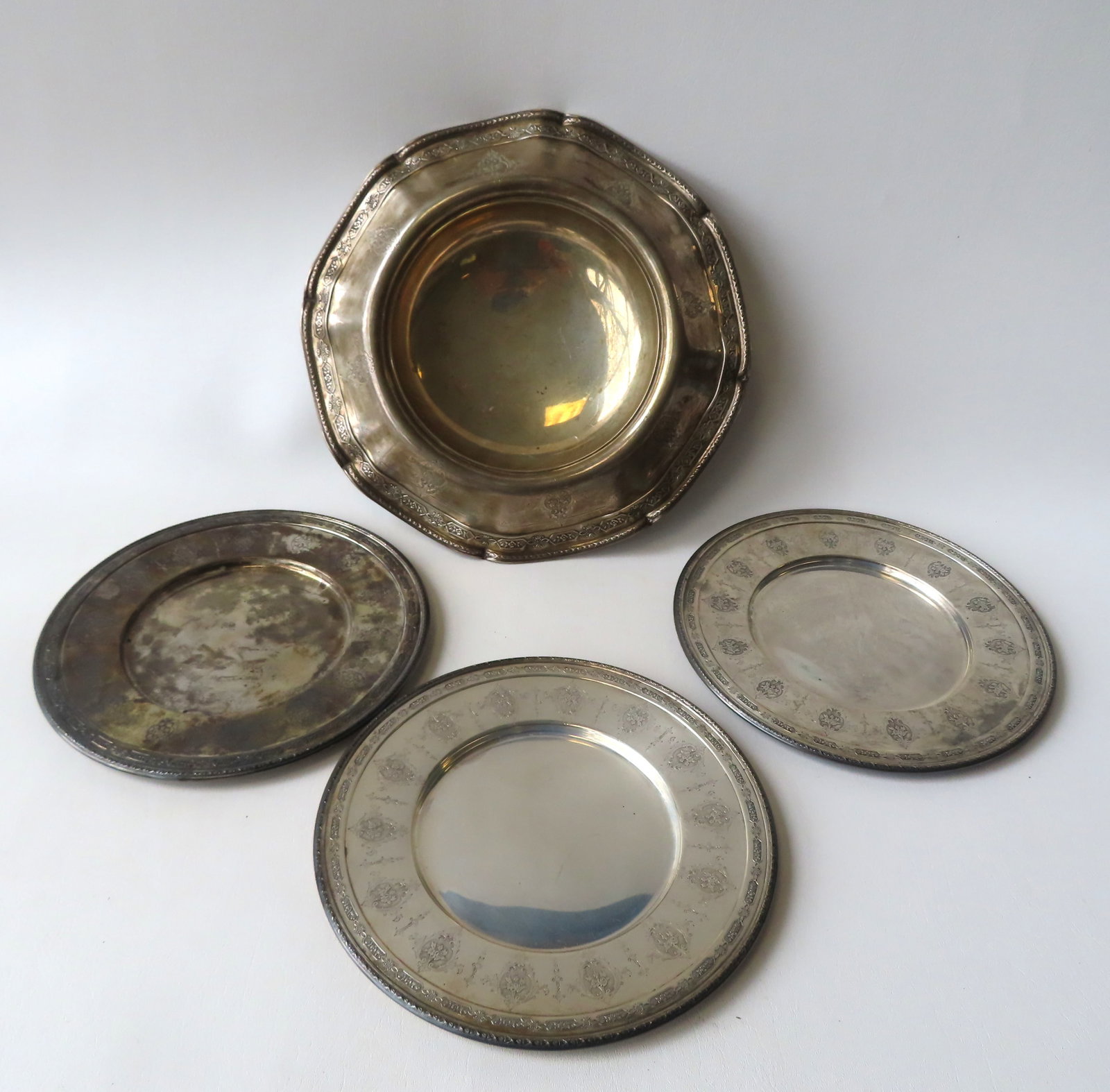 Four pieces of Towle Sterling silver in Louis XIV pattern, patent Dec. 23, 1919 including: Serving: Four pieces of Towle Sterling silver in Louis XIV pattern, patent Dec. 23, 1919 including: Serving bowl with flared rim measuring 14 1/4" diameter x 2 3/4"H - very good condition; and 3 matching measu