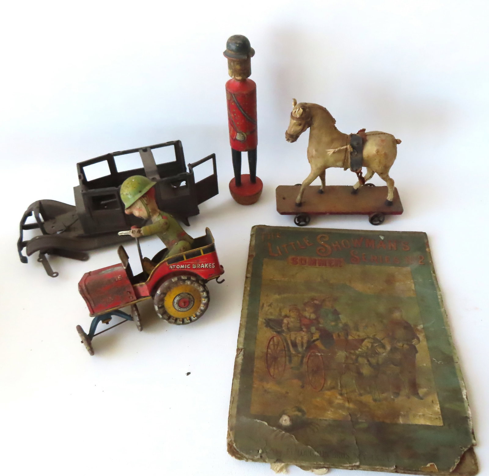 Lot of vintage toys, all in poor to fair condition, including: A hide covered horse on wheels (the: Lot of vintage toys, all in poor to fair condition, including: A hide covered horse on wheels (the hide is all hand sewn) - missing tail and saddle, Unique Art GI Joe and his Jouncing Jeep - loss of w