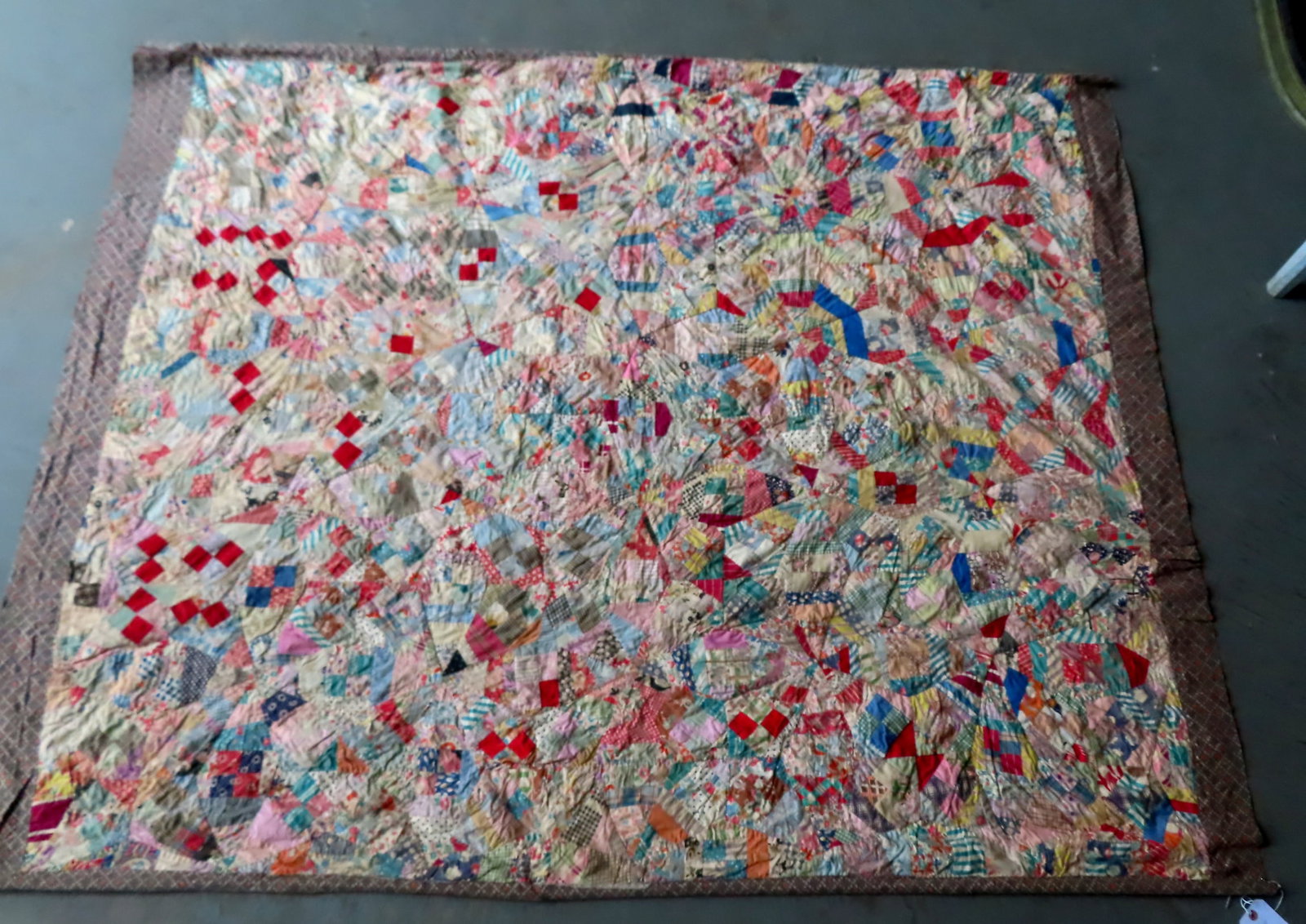 Patchwork crazy quilt, circa 1930.: Patchwork crazy quilt, circa 1930 - wooden supports on 2 ends for hanging on wall. Good condition.