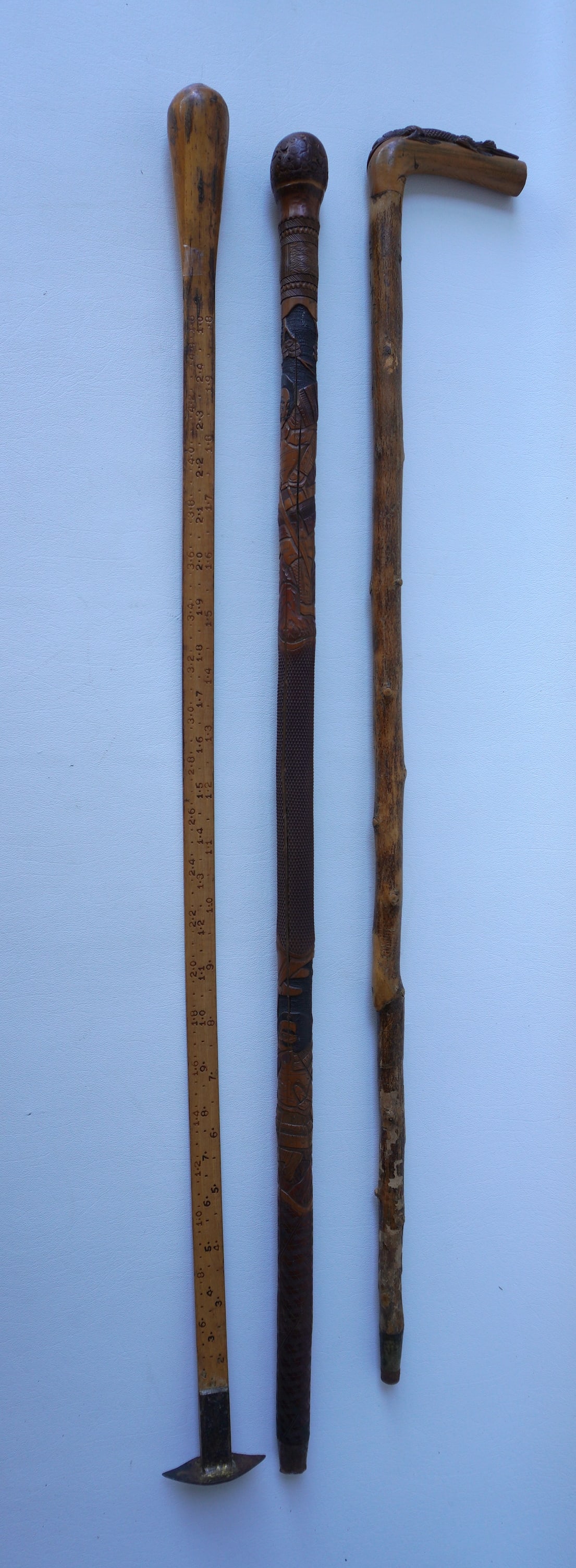 Three country items including 2 walking sticks - one with carved alligator handle and the other (1 of 6)