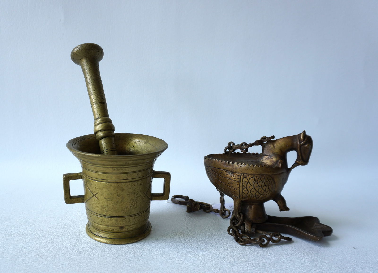 Two early brass collectibles: The first an 17th/18th century bronze mortar and pestle, very good (1 of 11)