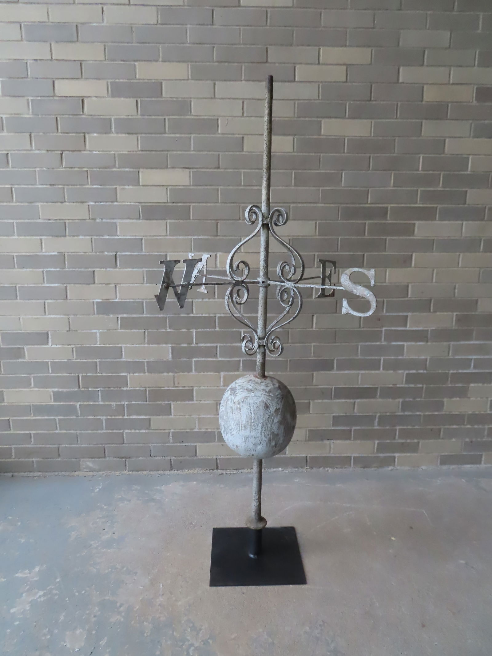 An early weathervane directional mounted on a copper orb. Good patination. The letters themselves (1 of 9)