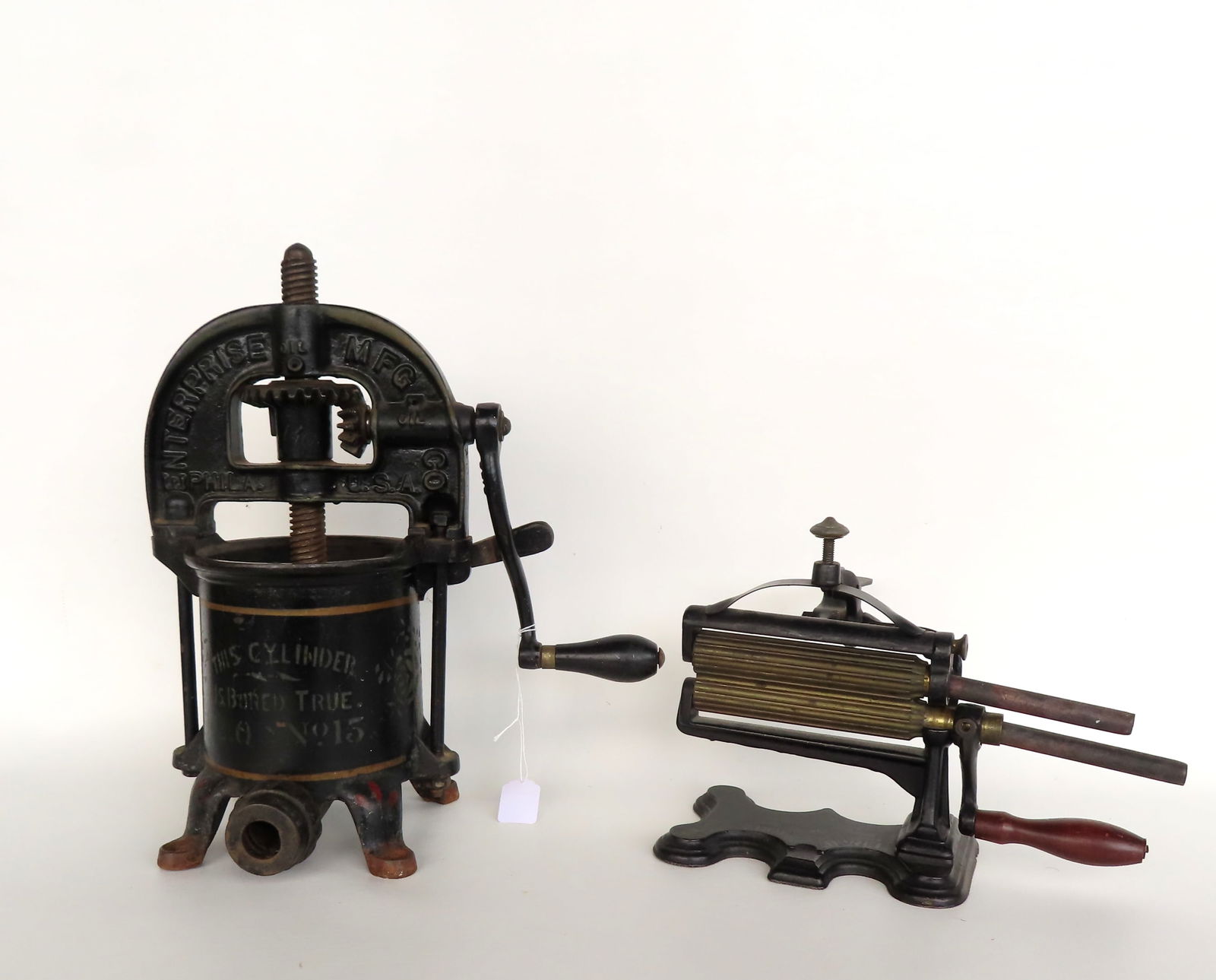 Two cast iron hand crank kitchen tools in original paint and stenciling, both in very good (1 of 6)