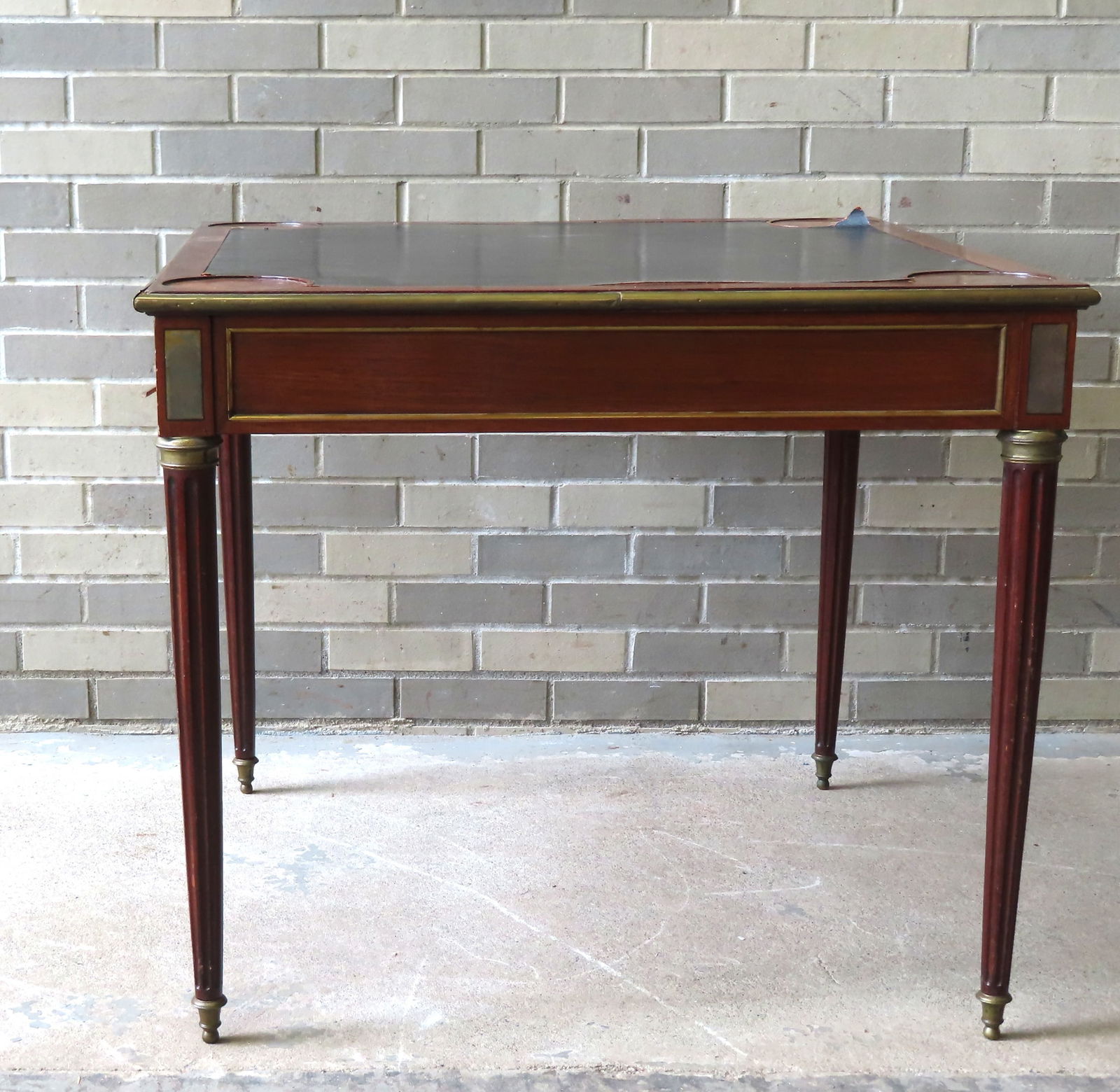 A Sheraton style mahogany card table with leather top having circular inset corners and brass (1 of 17)