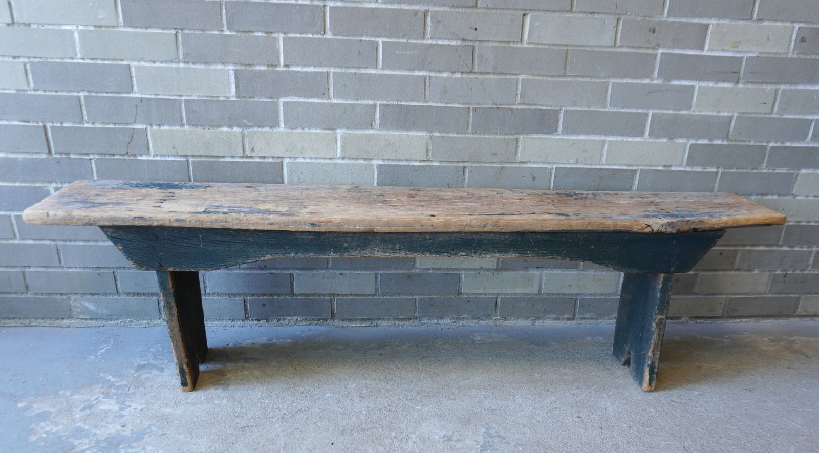 Primitive wooden bench with worn top (1 of 6)