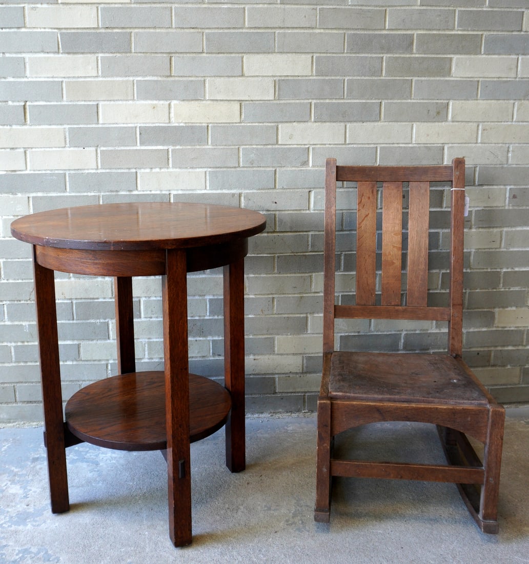 Two pieces of Mission oak furniture. The first a round table with lower shelf signed L. & J. G. (1 of 13)
