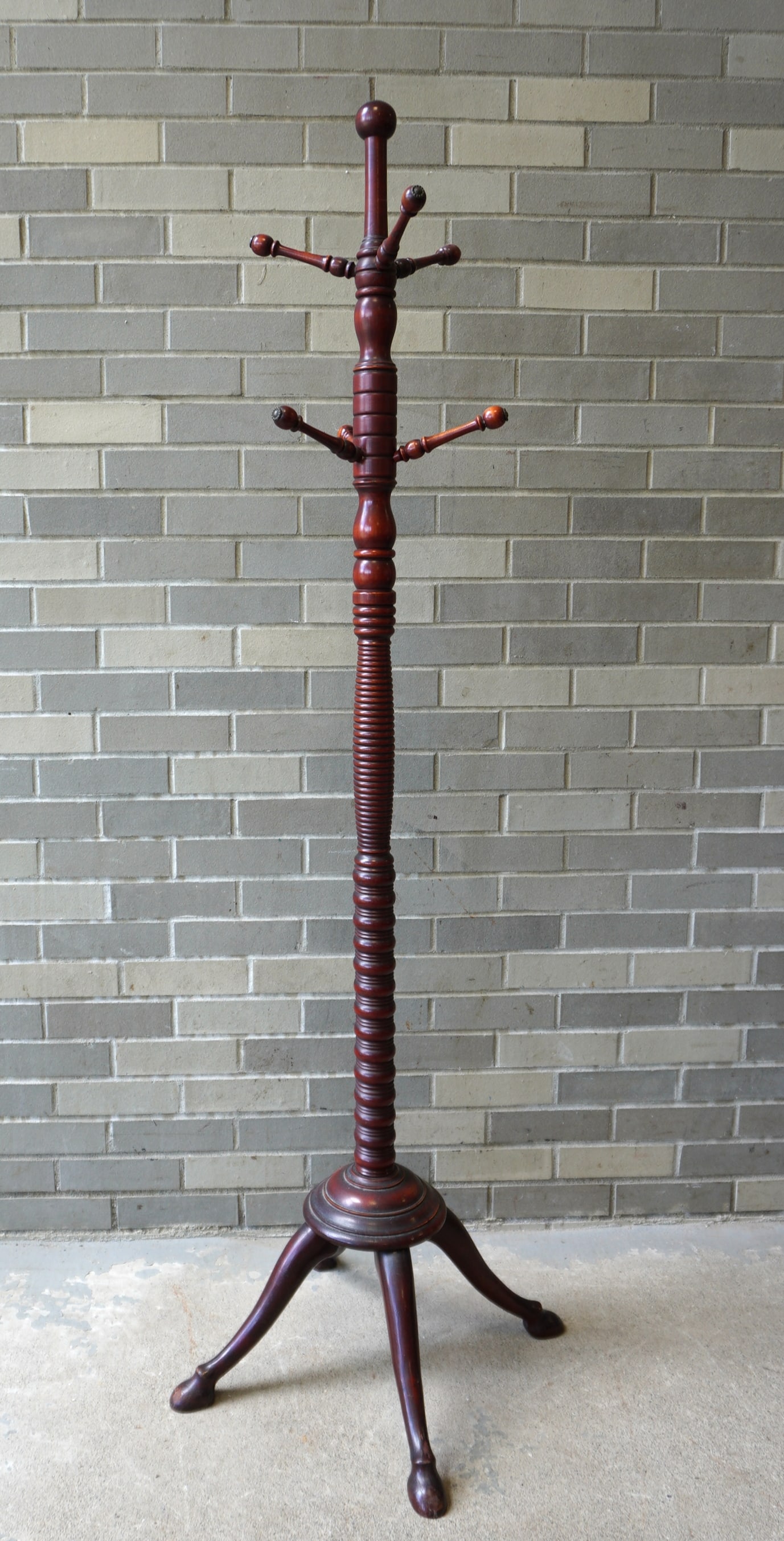 Mahogany floor standing hat rack with 4 spayed legs ending in hoof feet. The bolts attaching the (1 of 5)