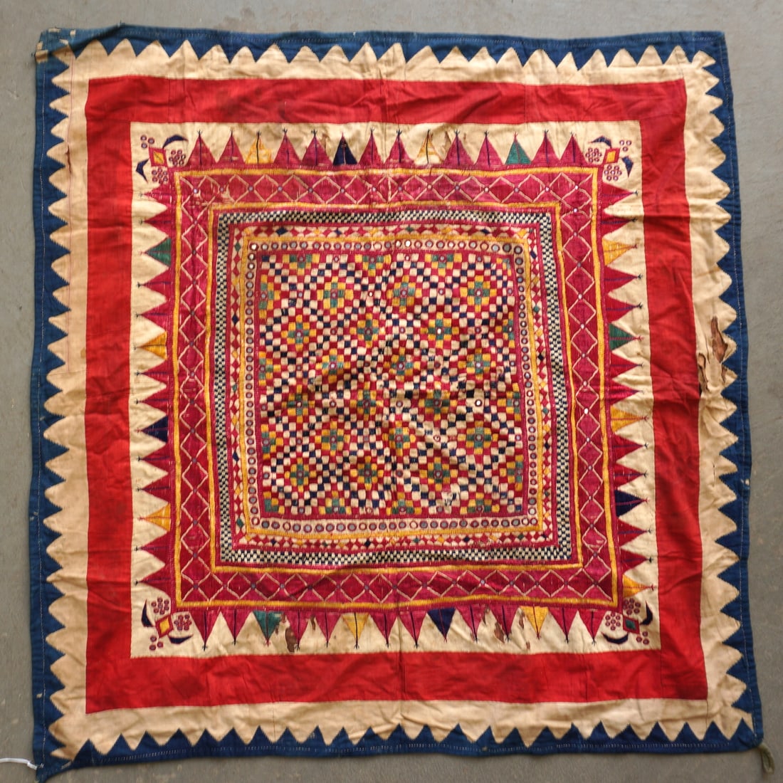 A very fine hand sewn textile (wall hanging or table cover), with pieced borders and decorated with (1 of 11)
