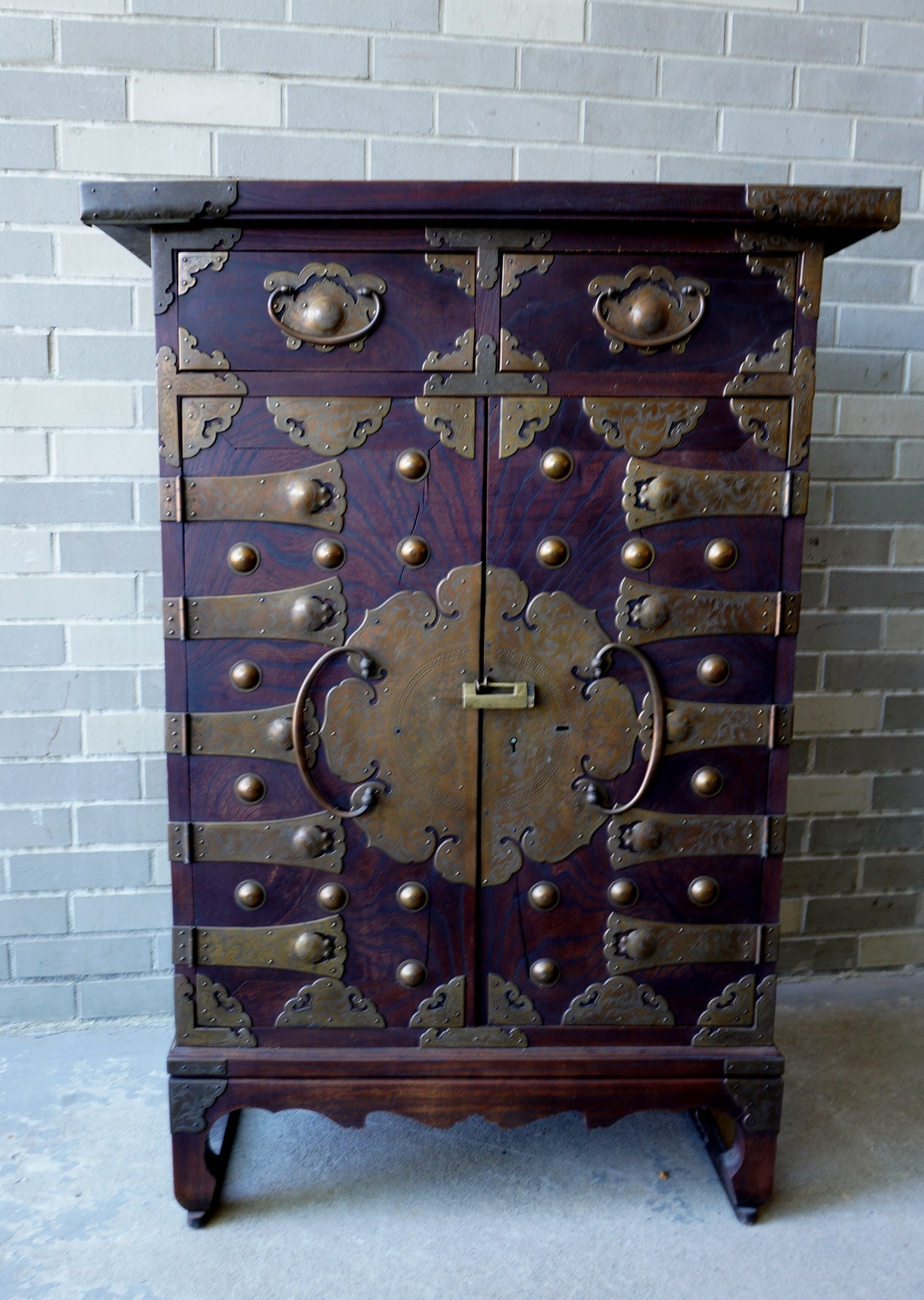 A very fine oriental chest having 2 drawers over 2 doors that enclose 9 drawers, 19th c. (1 of 12)