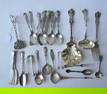 Grouping of sterling silver flatware and serving pieces and a fancy pair of Swedish .800 silver