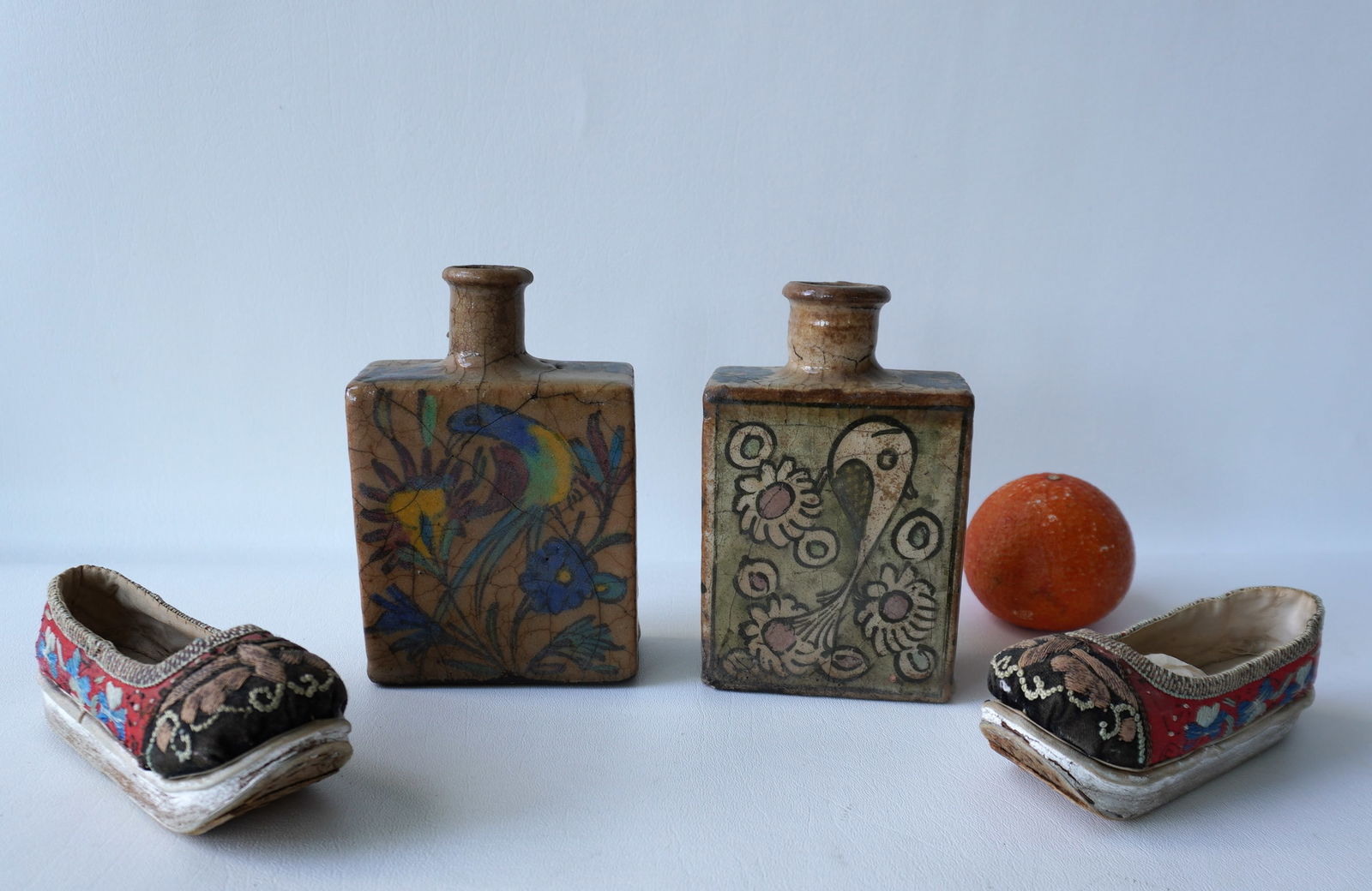 Two porcelain hand painted tea caddies decorated with birds and flowers, possibly Persian 19th (1 of 10)