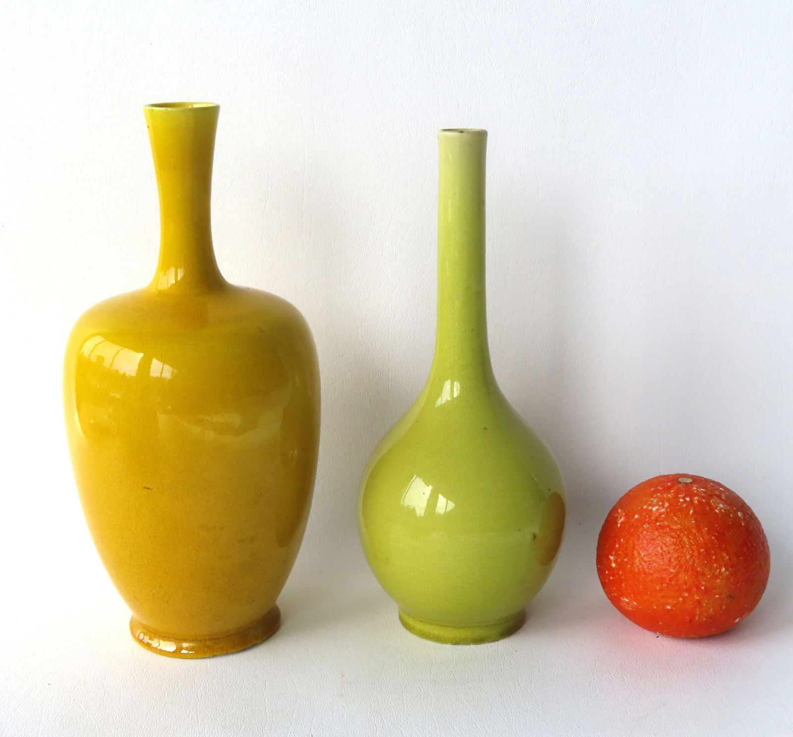 Two Chinese export bud vases, 18th/19th century. The first in yellow/green with long neck and footed (1 of 17)