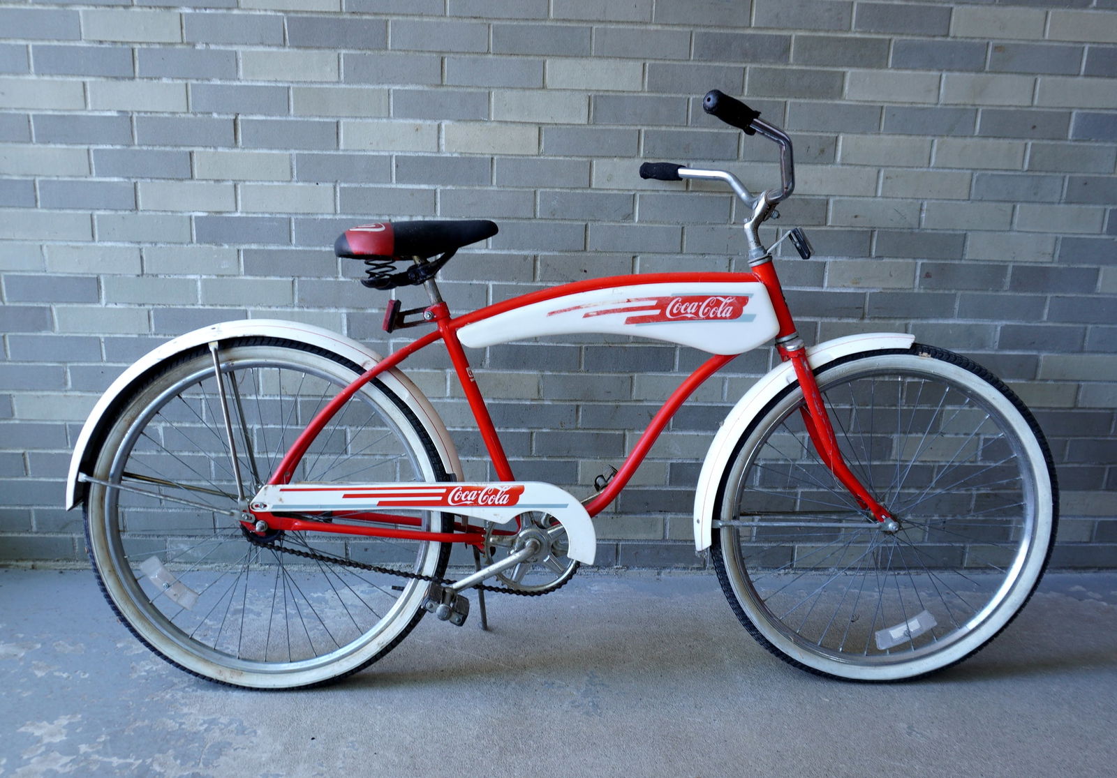 A Coca Cola promotional bicycle, 1980's. Made in USA by Huffy. Some surface abrasions, small dent in (1 of 10)