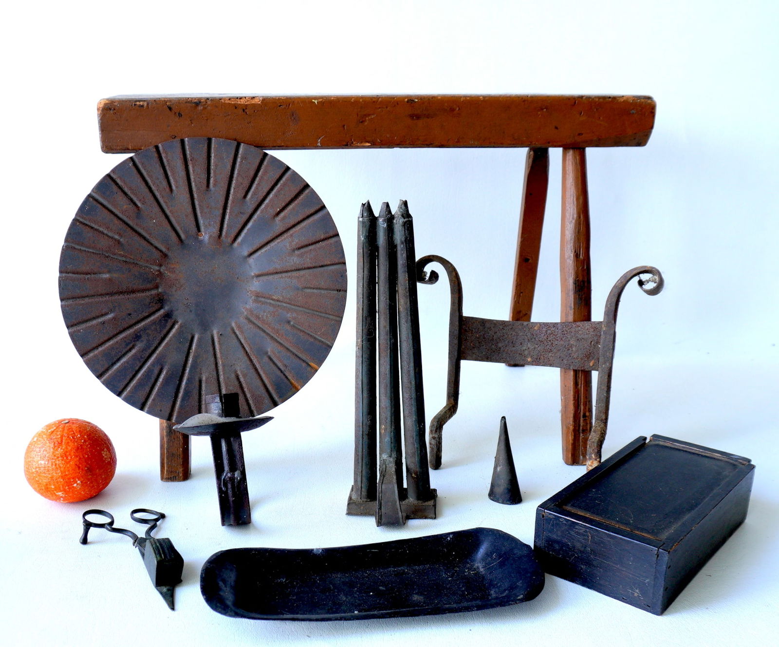 Grouping of country items including: A hand forged iron boot scraper - 19th century,  tin candle (1 of 10)