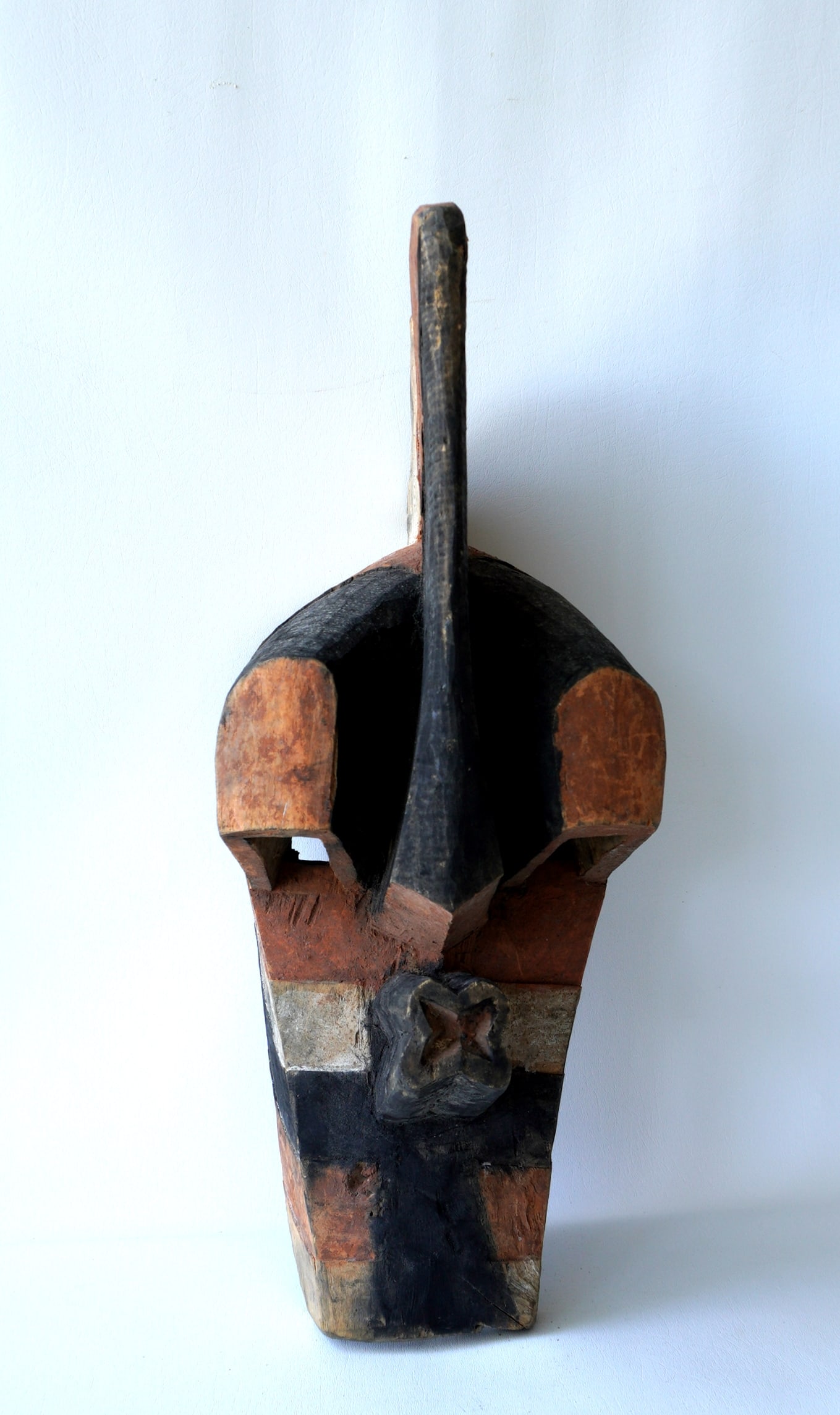 A large African Kifwebe lodge mask in original paint, good condition. Measures 25"H x 9 1/2'W x (1 of 8)