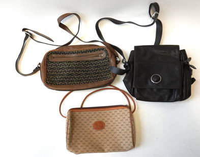 Three authentic lady's hand/shoulder bags including: Gianni Versace - very good condition; Gucci in: Three authentic lady's hand/shoulder bags including: Gianni Versace - very good condition; Gucci in cloth - very good condition; and Mark cross - cloth and leather - interior needs some cleaning, else