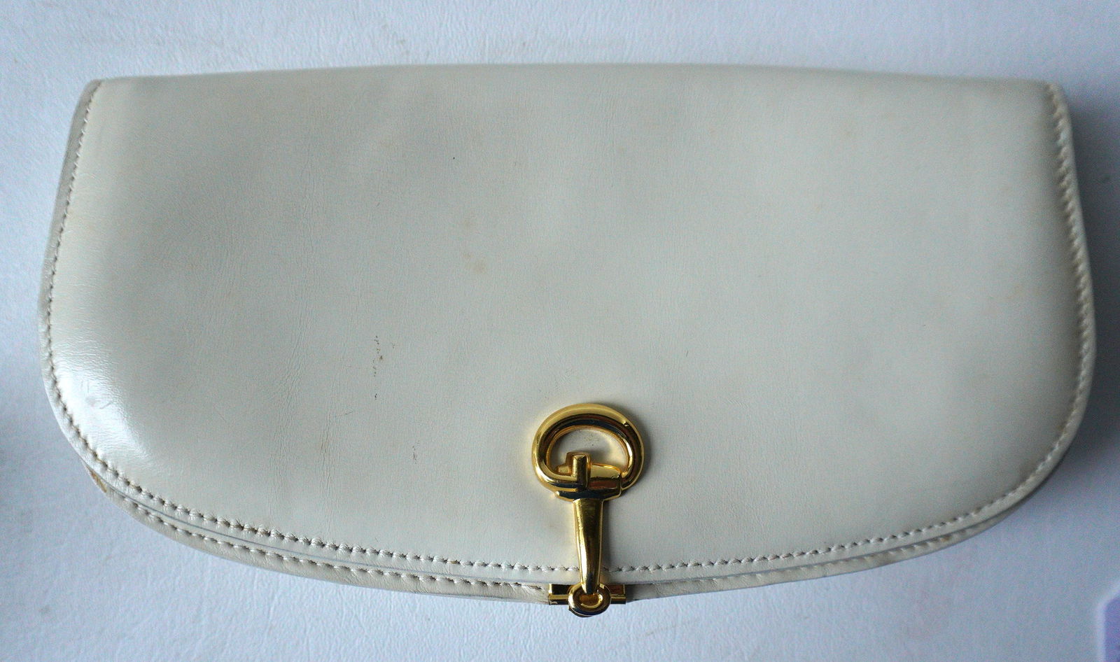 Authentic Gucci made in Italy, white leather evening bag, used but in very good condition. Sold with (1 of 7)
