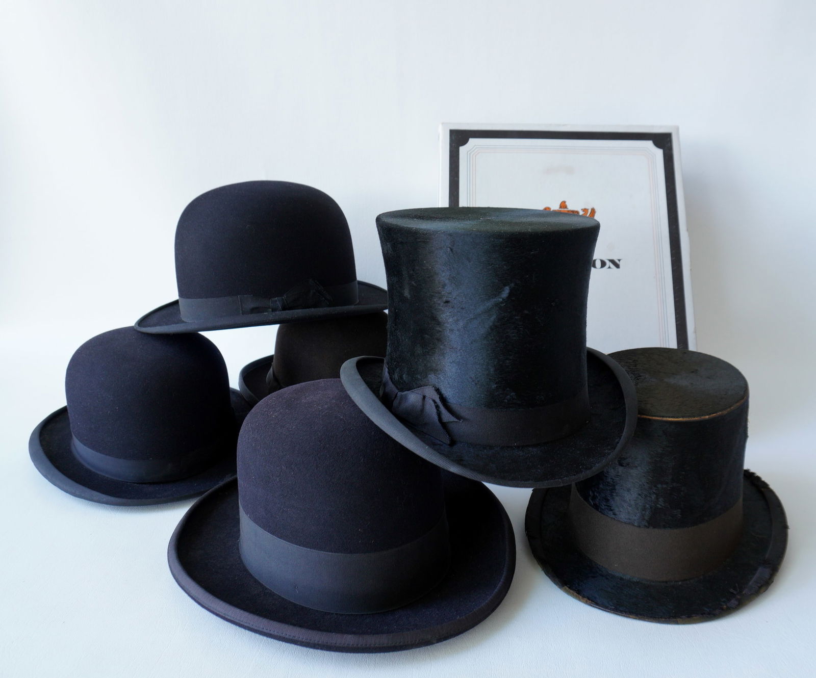 Grouping of vintage men's hats including 5 bowler and 2 top hats. (1 of 9)