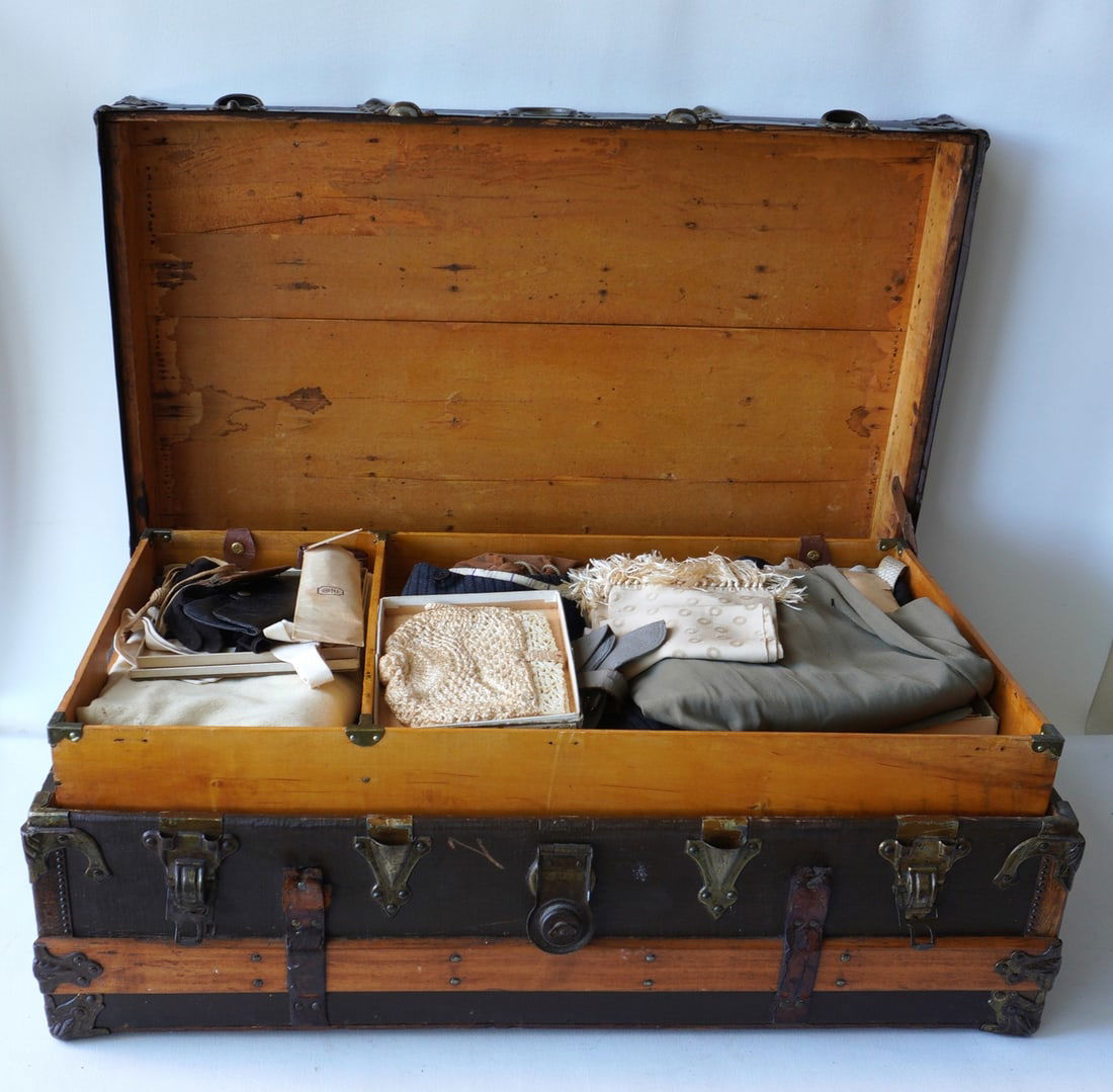 A vntage trunk full of gent's clothing, circa 1900-30, including pants, collars, vests, jackets, bow (1 of 20)