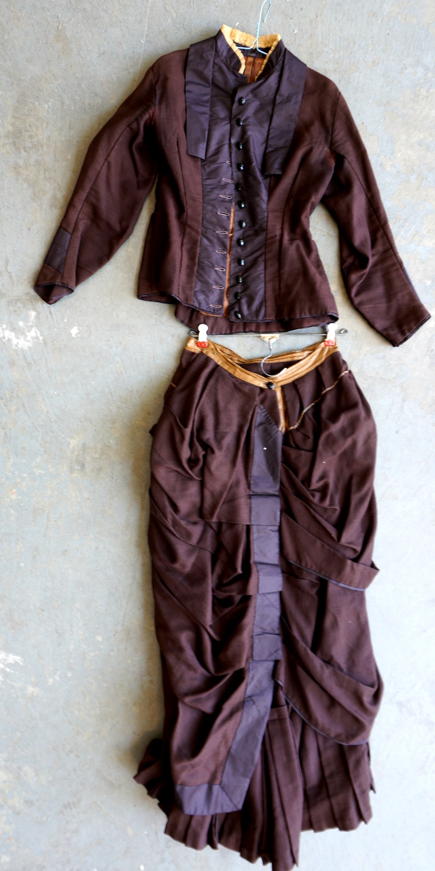 A Victorian 2 part lady's costume with vest and dress with original black glass buttons - parts of (1 of 8)