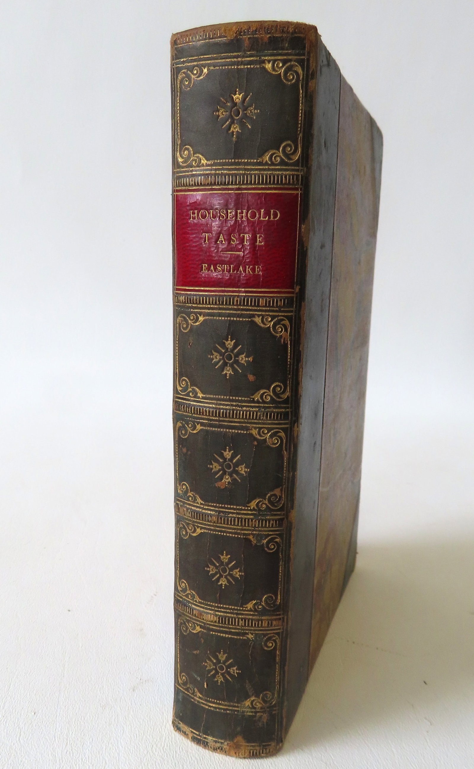Charles L. Eastlake, furniture designer and author of book "Hints On Household Taste In Furniture,: Charles L. Eastlake, furniture designer and author of book "Hints On Household Taste In Furniture, Upholstery and Other Details, third edition, published in London 1872. Marbleized leather covers with