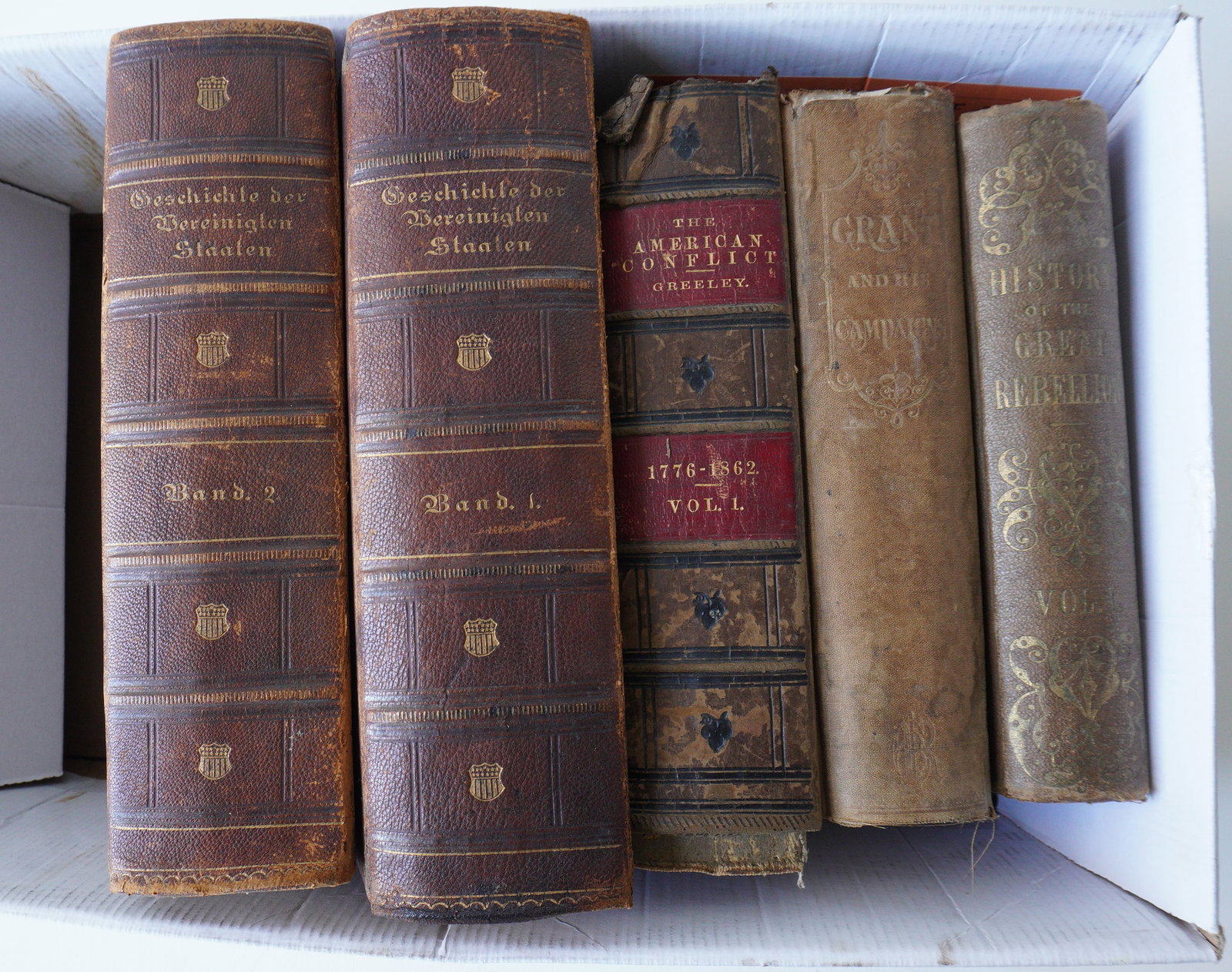 Five vintage Civil War and American history related books including: "History Of The Great: Five vintage Civil War and American history related books including: "History Of The Great Rebellion" by Thomas P. Kettell, published in NY by N.C. Miller, 1863 - the first few pages with some foxing,