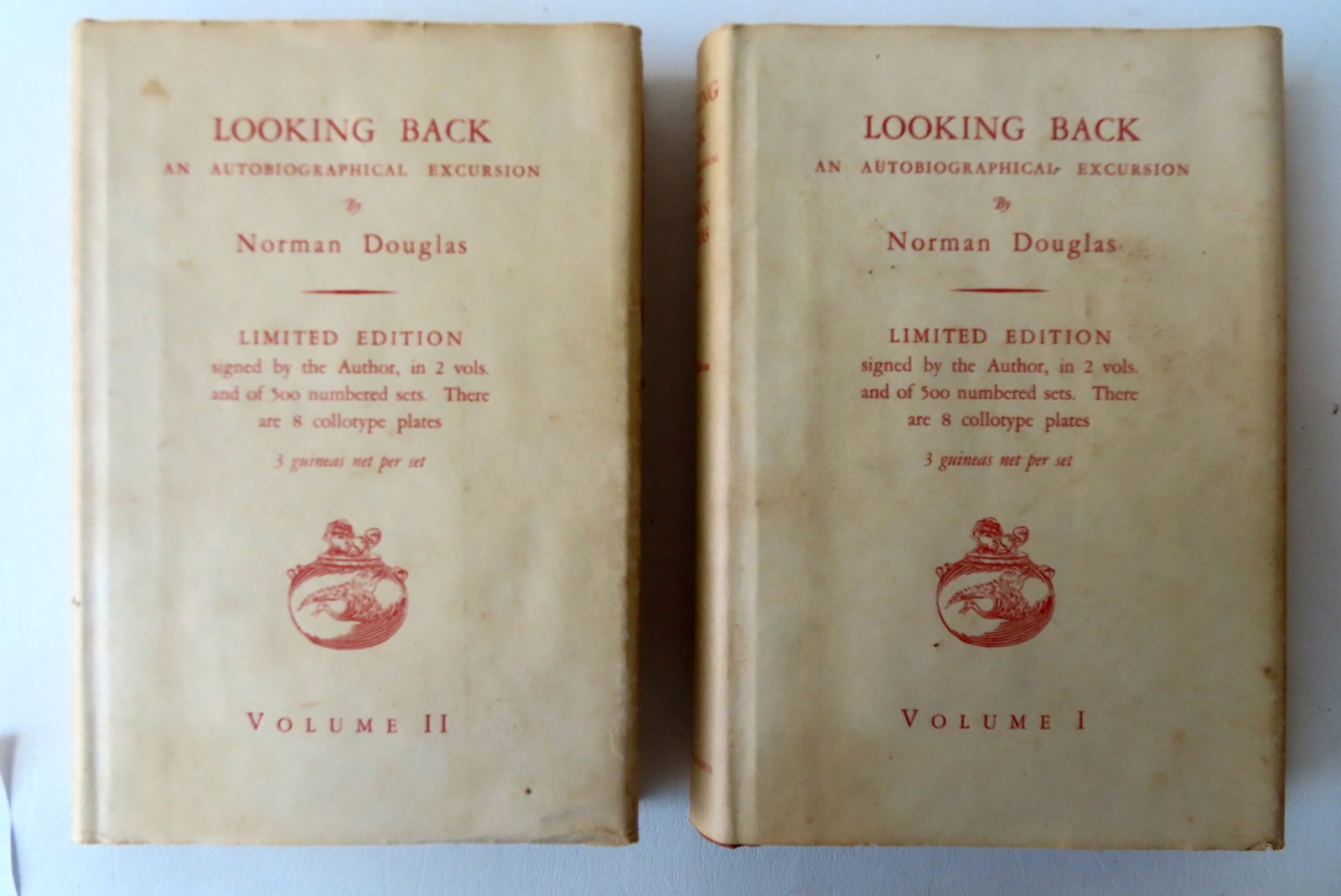 Author signed in limited edition "Looking Back - An Autobiographical Excursion" by Norman Douglas,: Author signed in limited edition "Looking Back - An Autobiographical Excursion" by Norman Douglas, in 2 volumes, limited edition 137/535 and signed by author in pen and ink. Published in London by Cha
