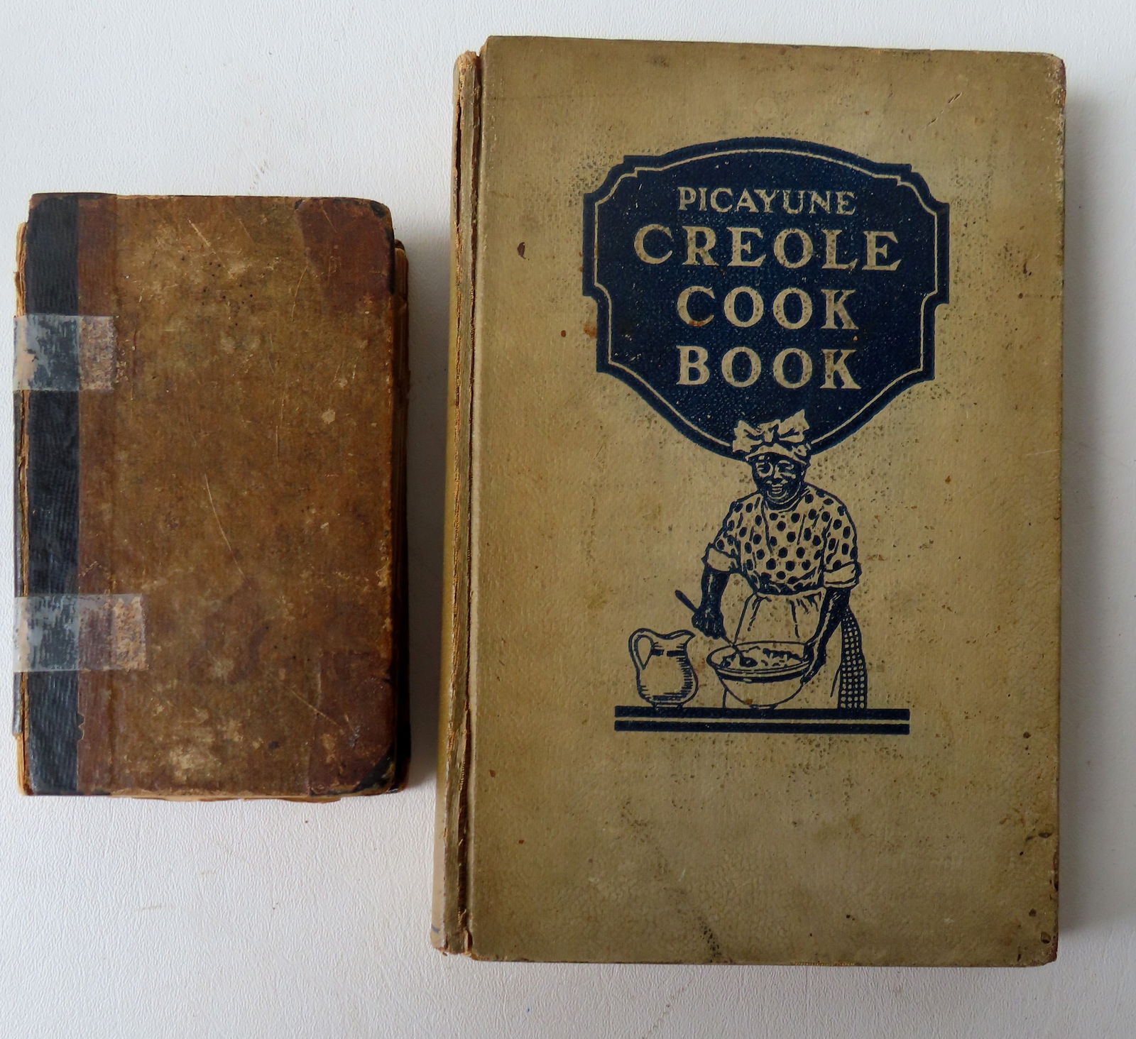 Two vintage cook books: The first "New System Of Domestic Cookery" by a "Lady", second edition, (1 of 4)