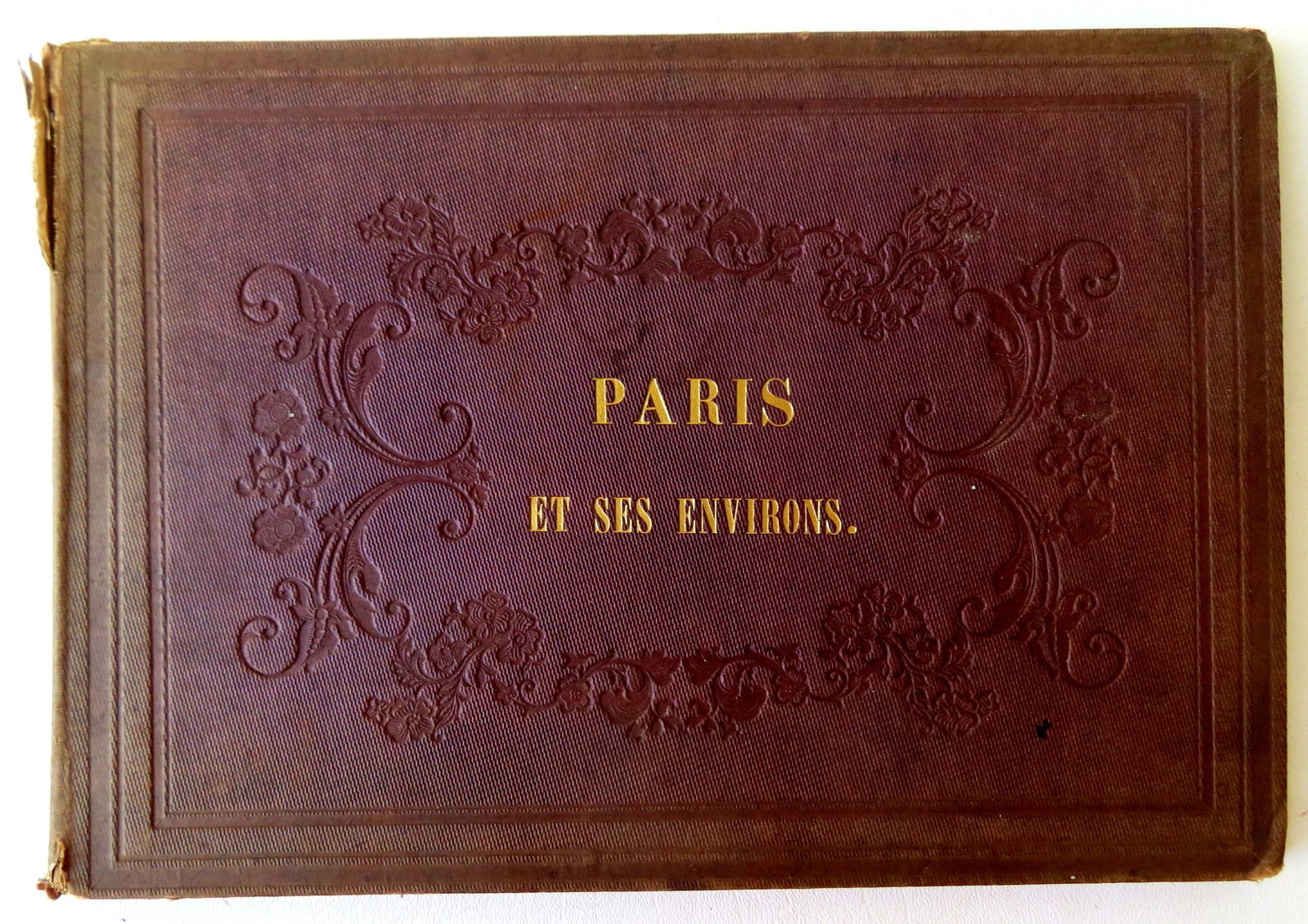 Book titled "Paris Et Ses Environs." (Paris and its surroundings) - it is dated in pencil first: Book titled "Paris Et Ses Environs." (Paris and its surroundings) - it is dated in pencil first blank page 1854 - complete with30 hand colored plates. Foxing on some images, but overall very good cond