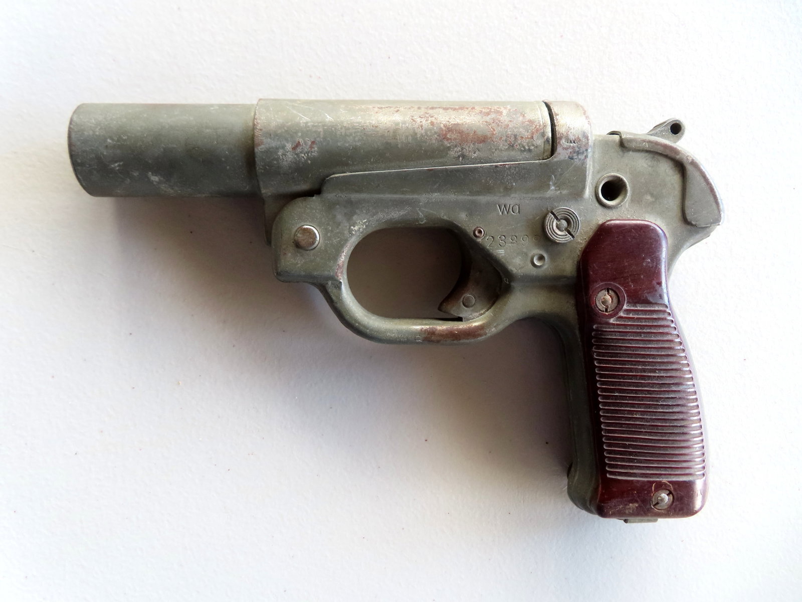 German WWII flare pistol Model LP42, marked WA (WA stands for Waffenfabrik): German WWII flare pistol Model LP42, marked WA (WA stands for Waffenfabrik - translates to Weapons Factory). This factory was located in Leipzig and Hugo Schneider Aktiengesellschaft-Metalwarenfabrik 