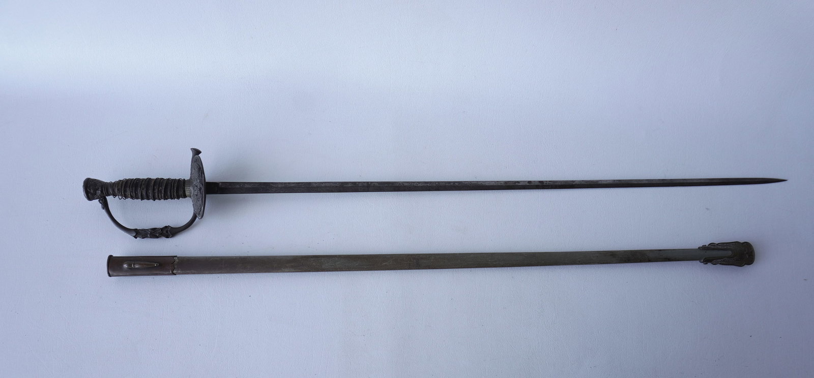 US M1860 Army field officer's sword with scabbard and having an engraved patriotic blade marked U.S.: US M1860 Army field officer's sword with scabbard and having an engraved patriotic blade marked U.S. on one side and a spread wing eagle on the other side, signed "J.A. Joel & Co .New York". Blade 30"